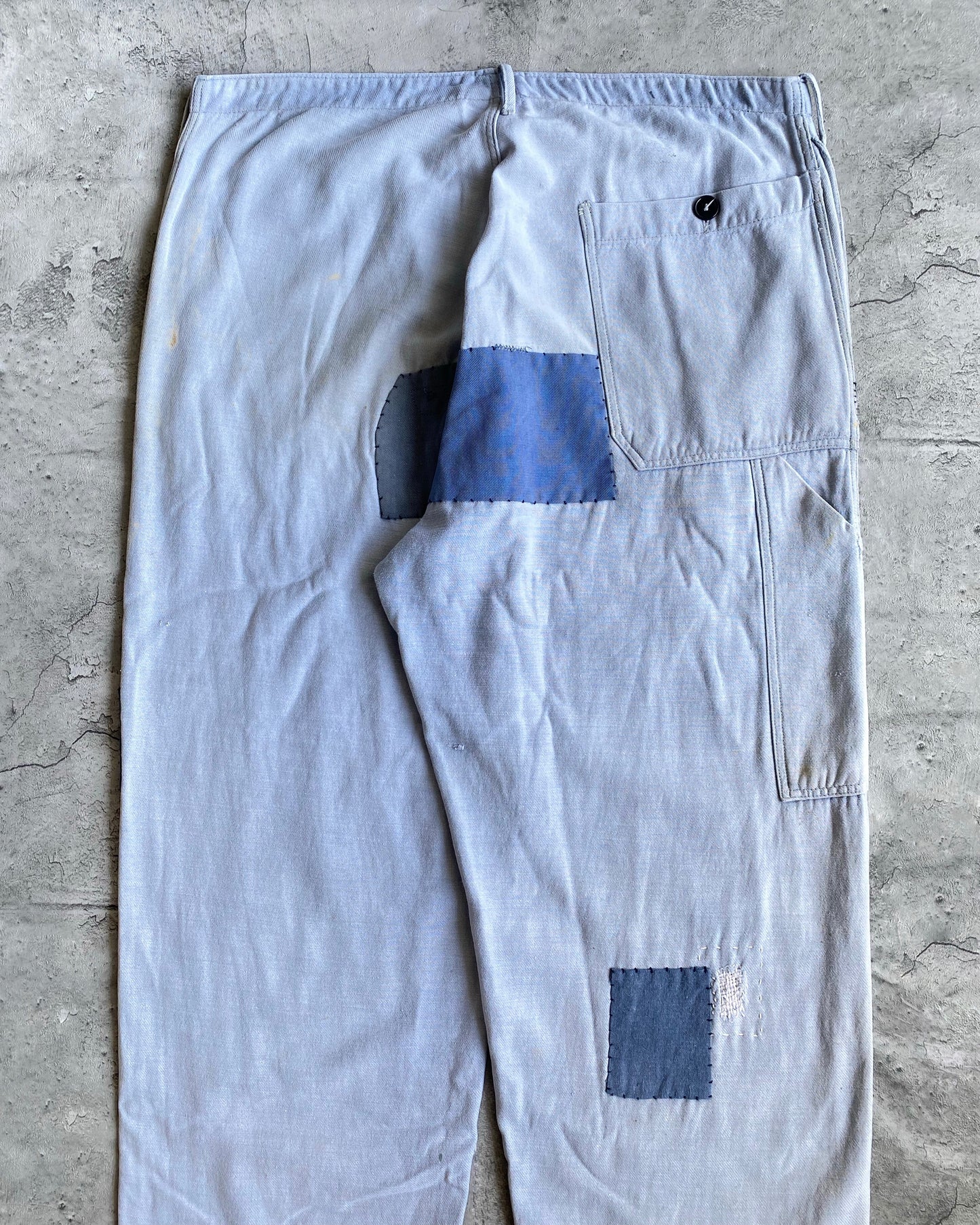 1960S FADED BLUE REPAIRED FRENCH WORK TROUSERS (35x30)
