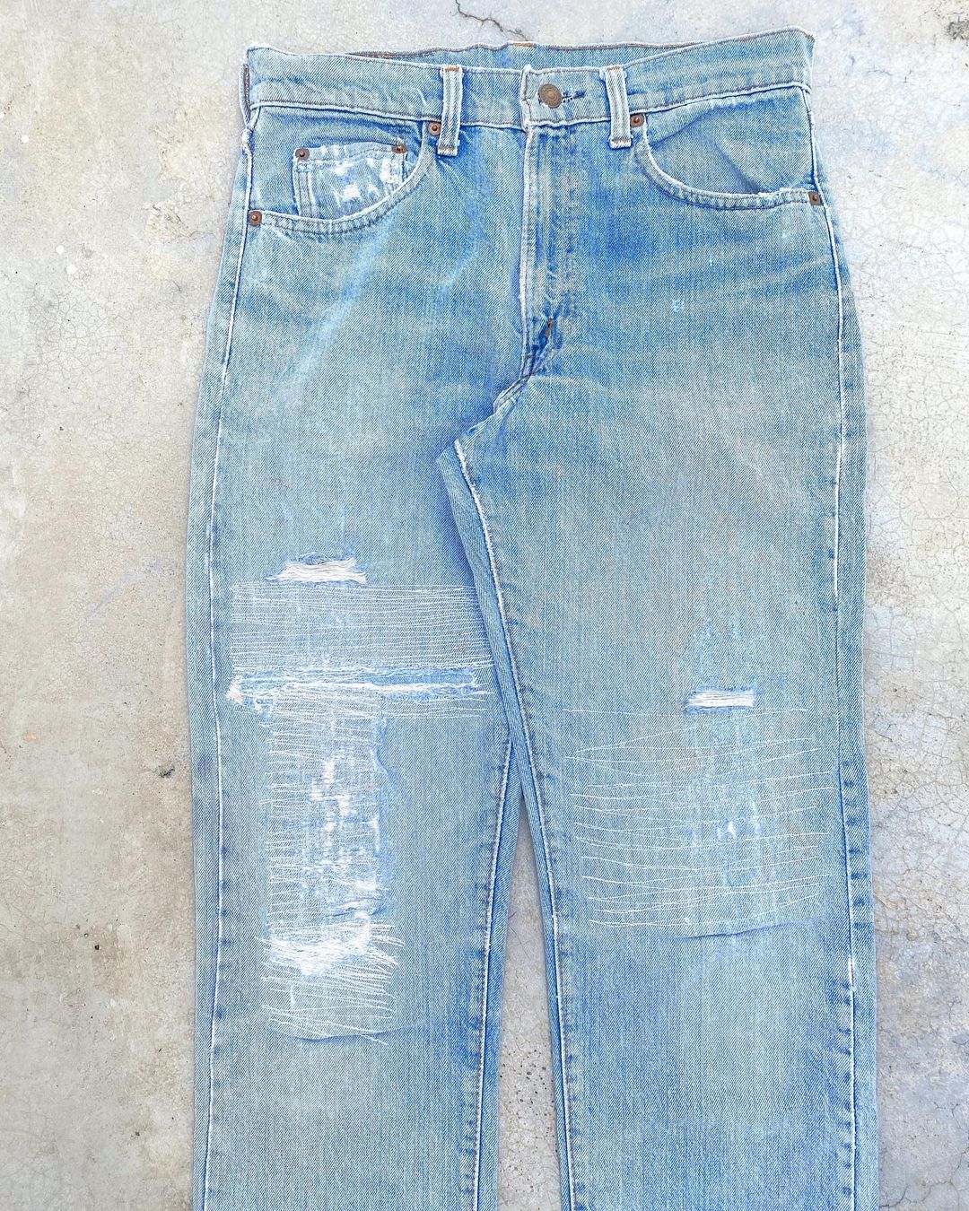 1980S LEVI’S 505 REPAIRED JEANS (30X34)