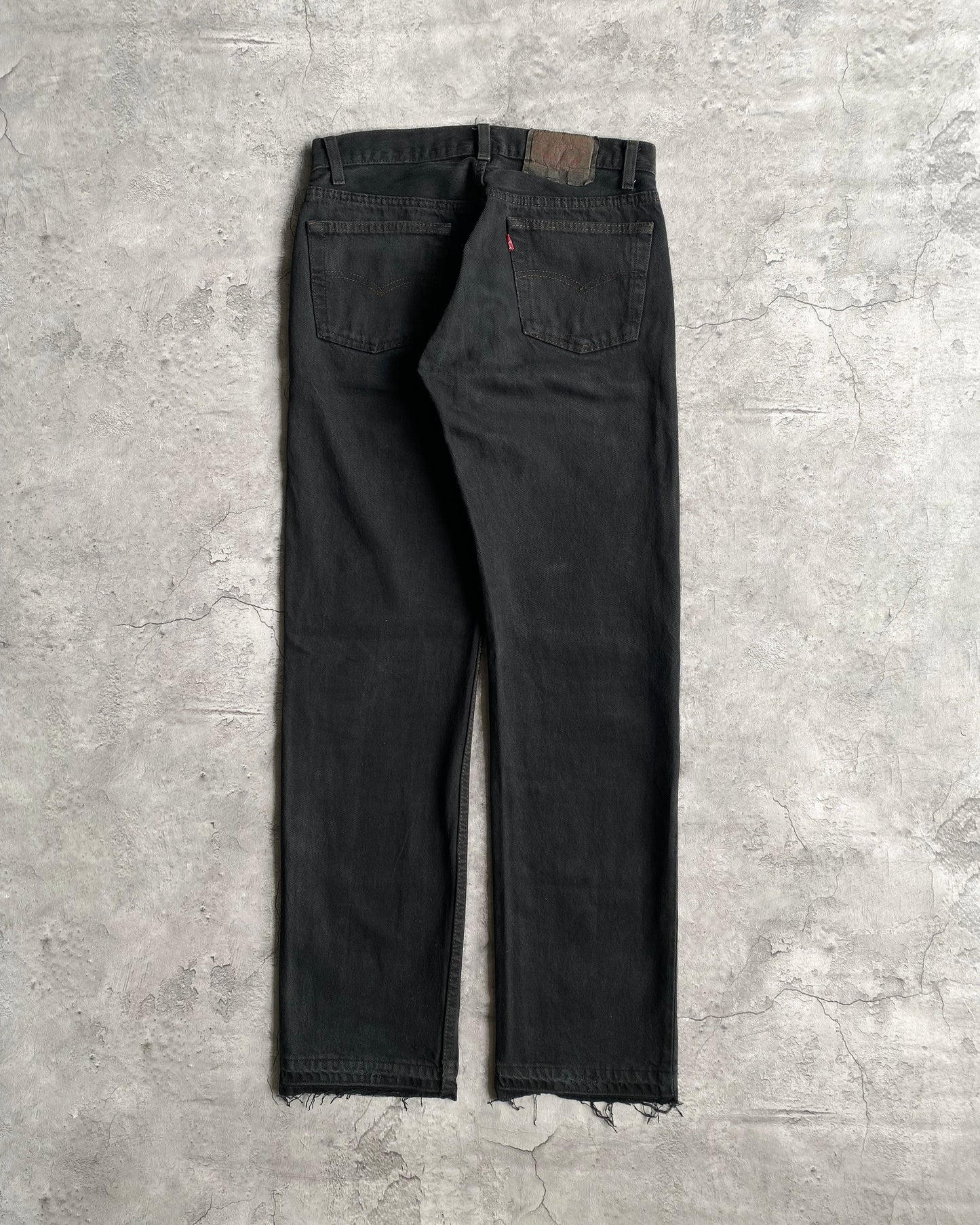 1980S BLACK OVERDYED LEVI'S 501 RELEASED HEM JEANS (30X30)