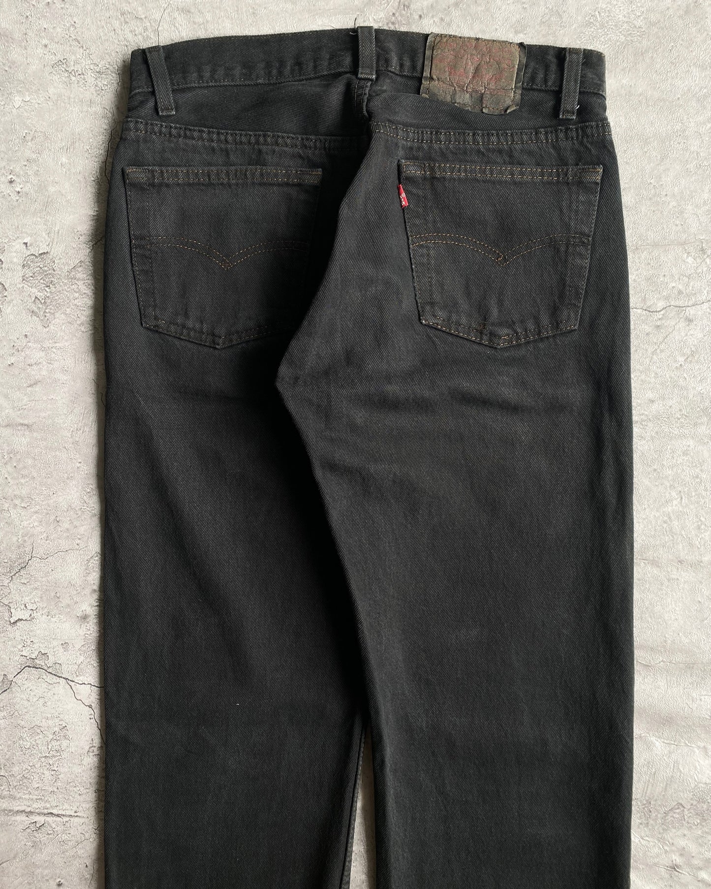 1980S BLACK OVERDYED LEVI'S 501 RELEASED HEM JEANS (30X30)