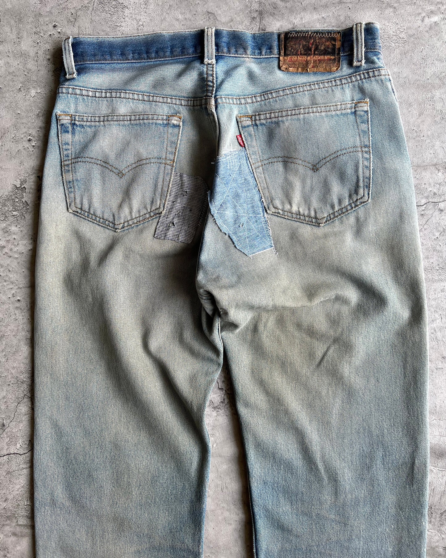 1980S TWO-TONE LEVI'S 501 REPAIRED JEANS (35X32)