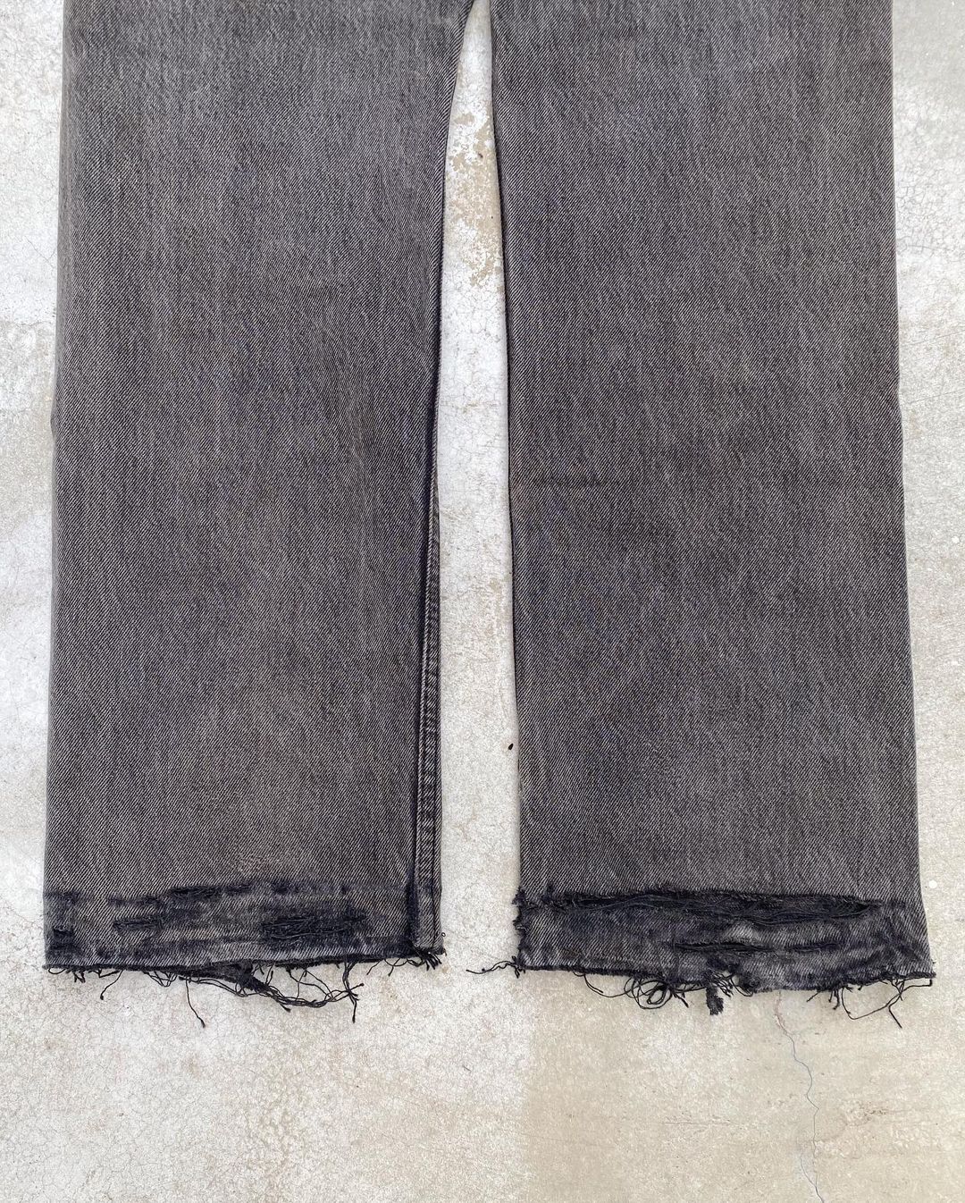 1990s Faded Black Levi’s 501 Repaired Jeans