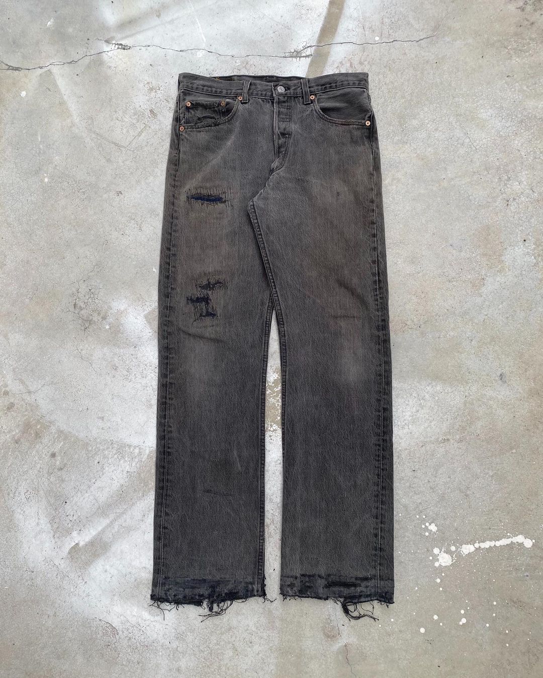 1990s Faded Black Levi’s 501 Repaired Jeans