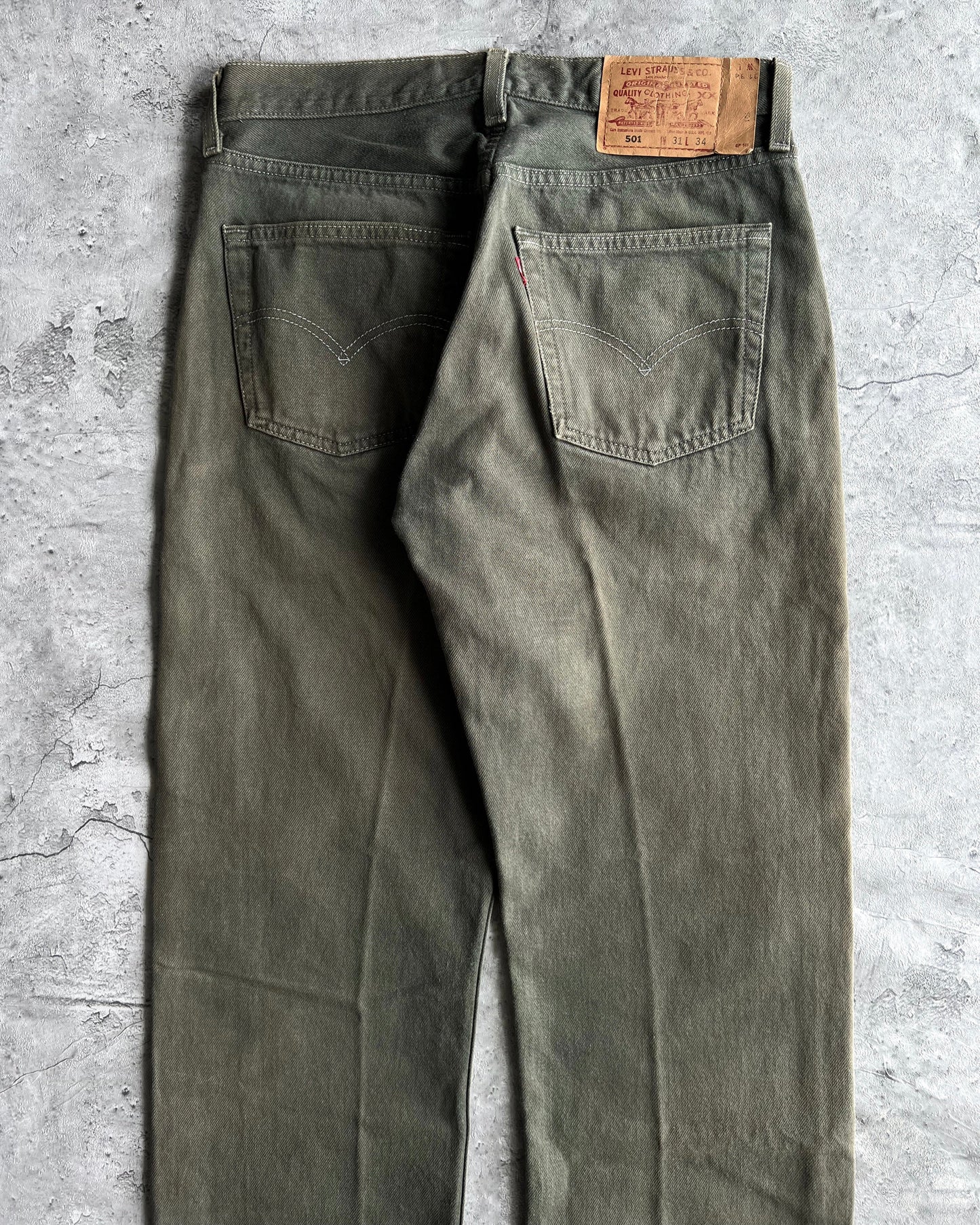 1990S FADED GREEN LEVI'S 501 RELEASED HEM JEANS (31X34)