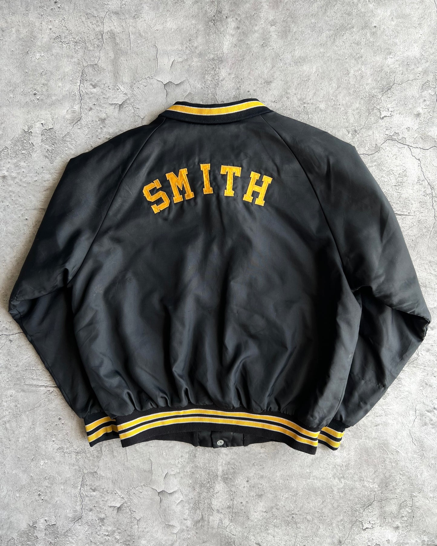1970S BLACK 'PIRATES' RAGLAN VARSITY JACKET (L)