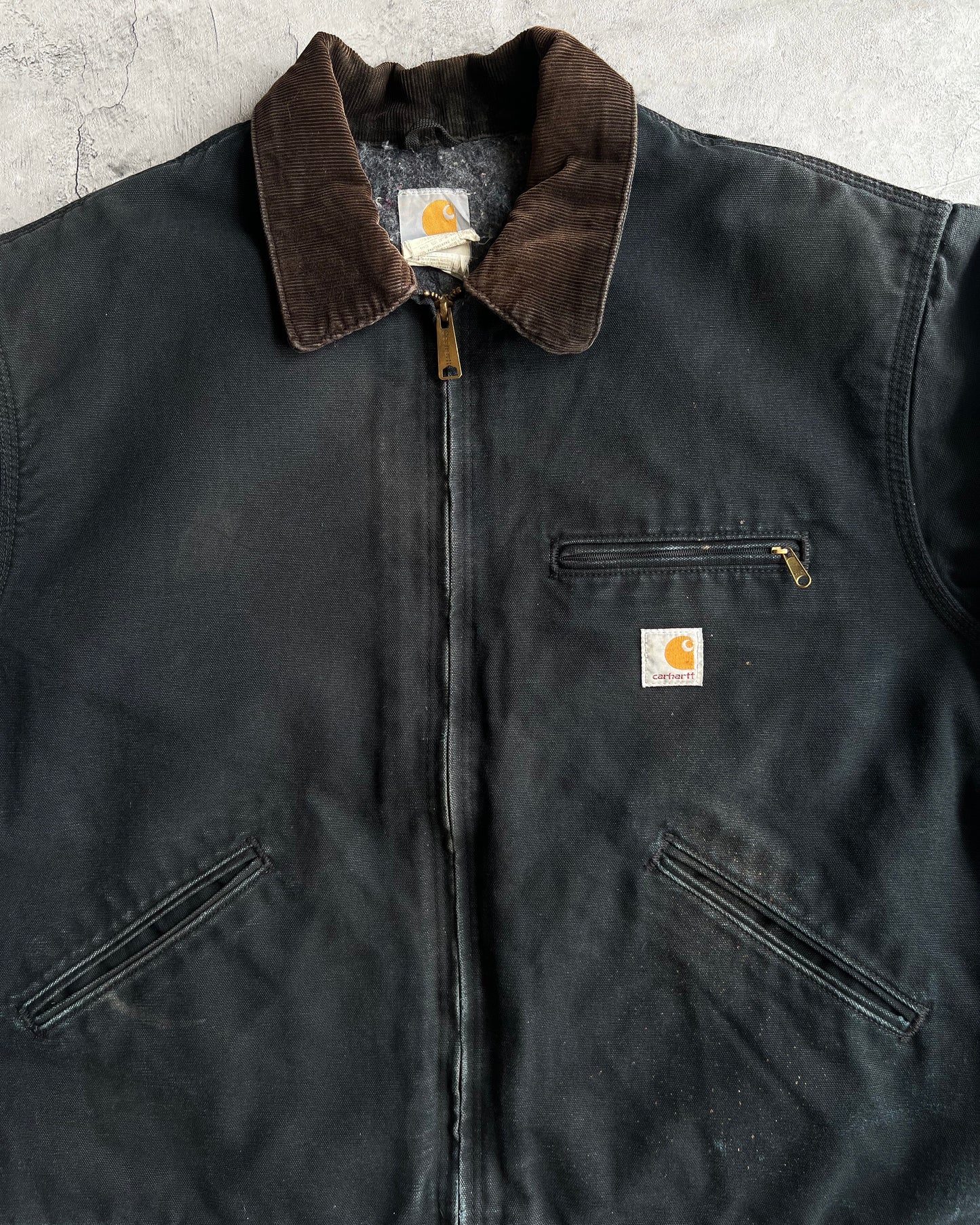 1990S FADED BLACK CARHARTT DETROIT WORK JACKET (XL)