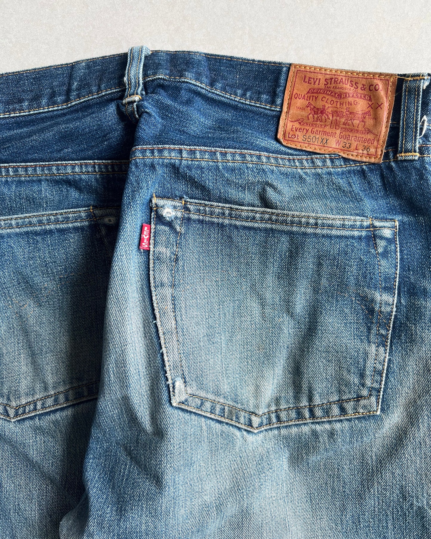 1990S FADED WASHED BIG E LEVI'S 501 SELVEDGE JEANS (33X36)