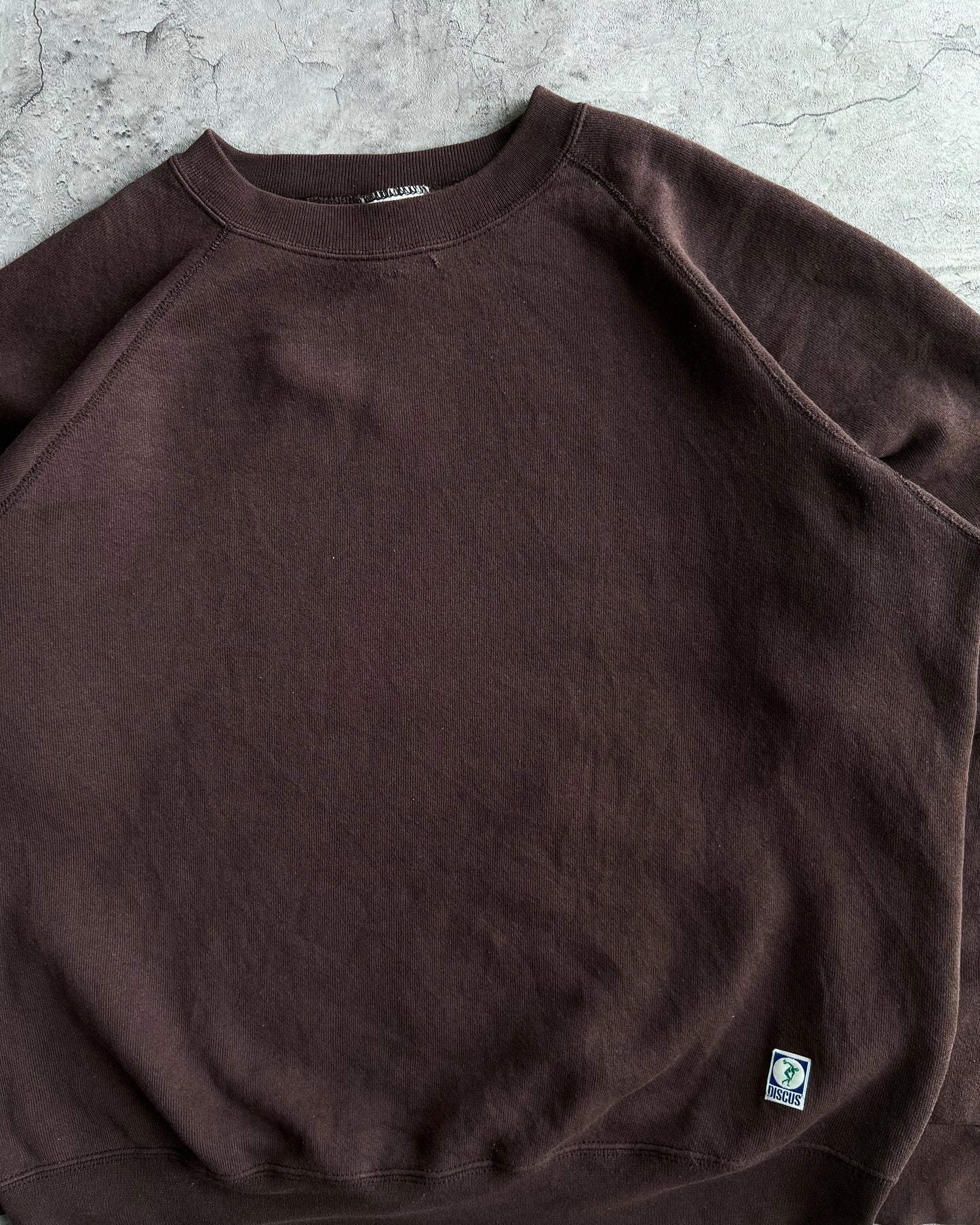 1990S BROWN BLANK DISCUS RAGLAN SWEATSHIRT (L)