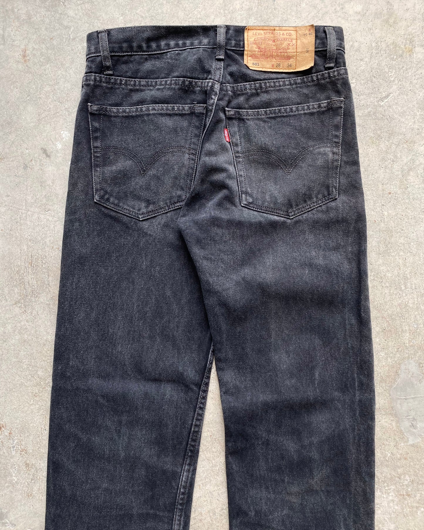 1990S BLACK LEVI'S 501 RELEASE HEM JEANS (28X34)