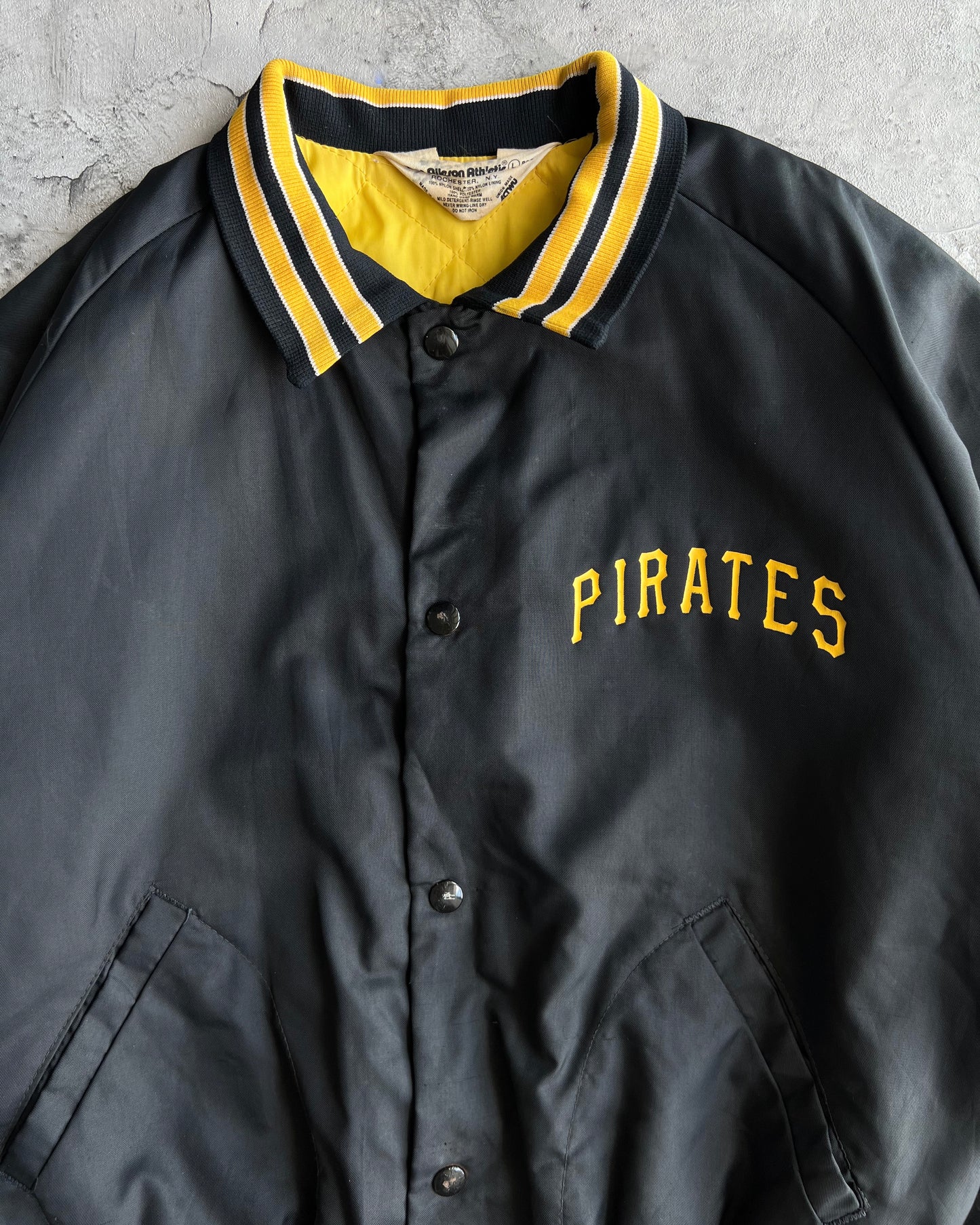 1970S BLACK 'PIRATES' RAGLAN VARSITY JACKET (L)