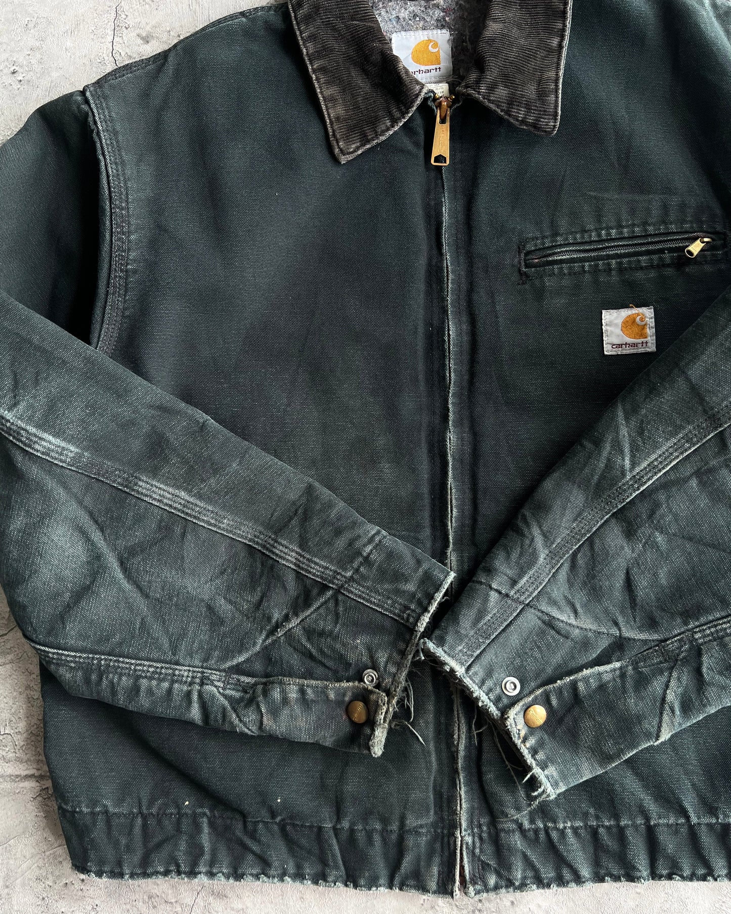1990S FADED BLACK/MOSS GREEN CARHARTT DETROIT WORK JACKET (M/L)