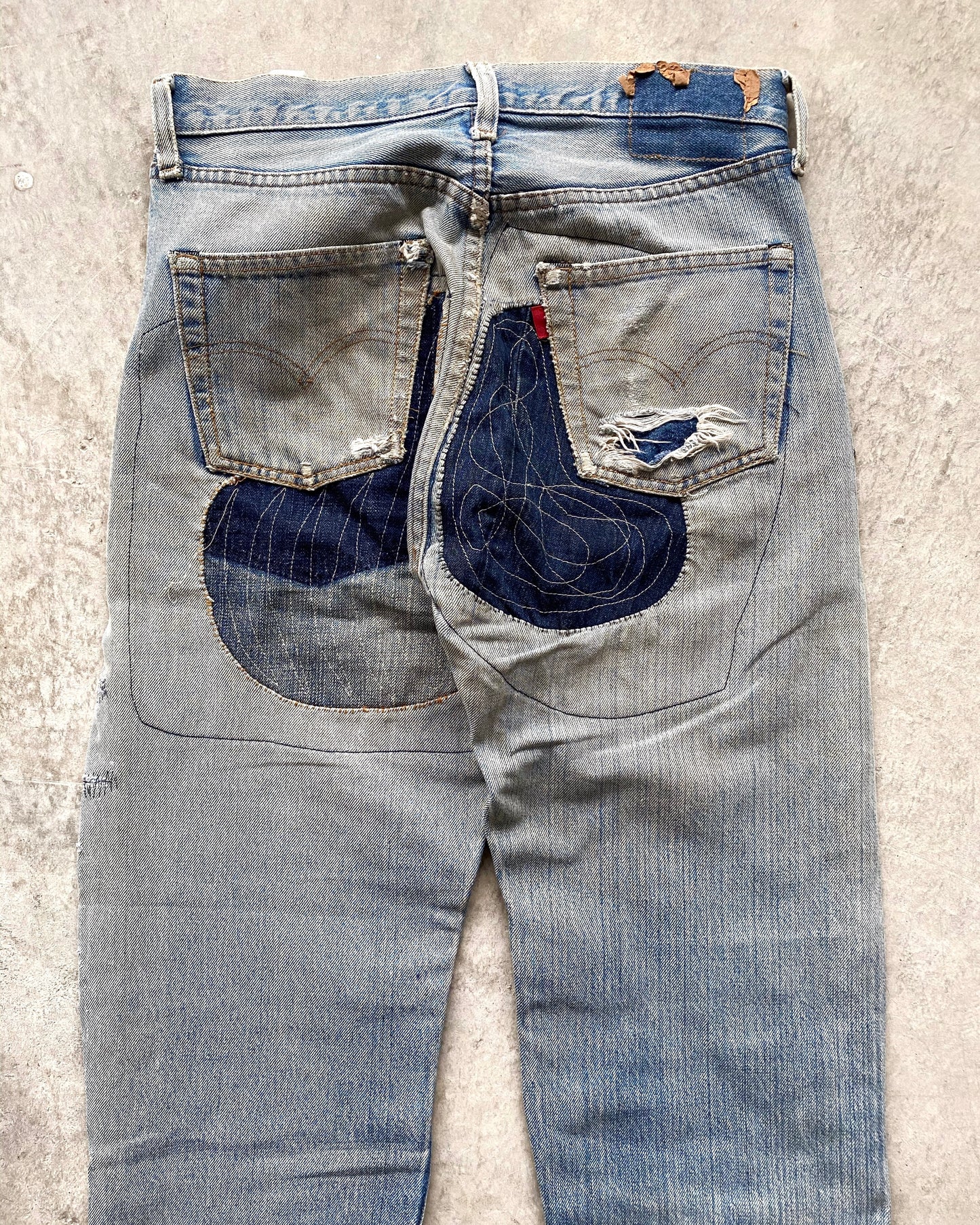1980S MAJOR REPAIRED LEVI'S 501 REDLINE SELVEDGE JEANS (31X38)