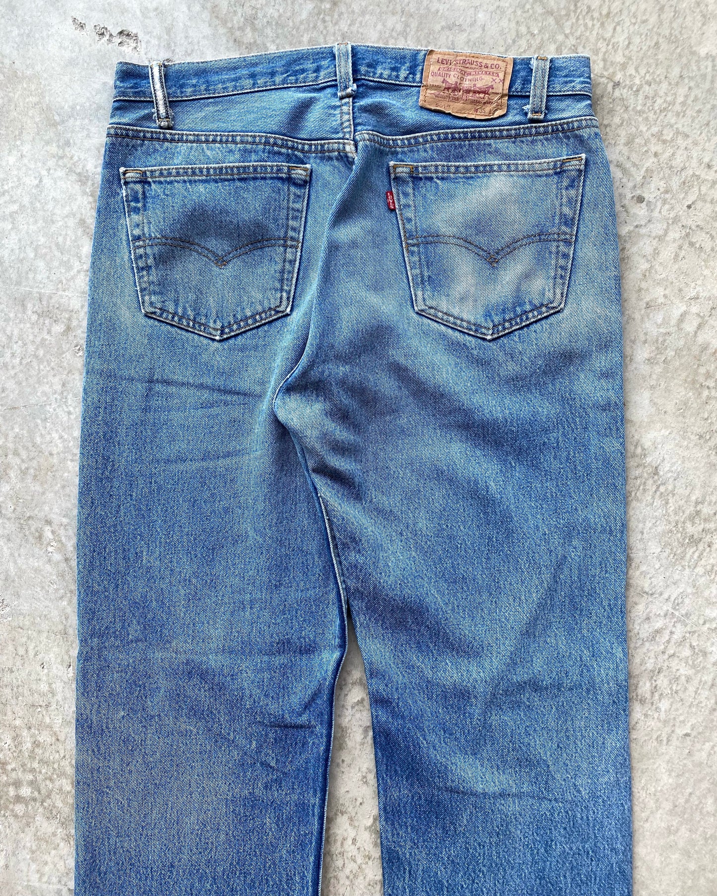 1980S FADED LEVI'S 501 RELEASED HEM JEANS (35X32)