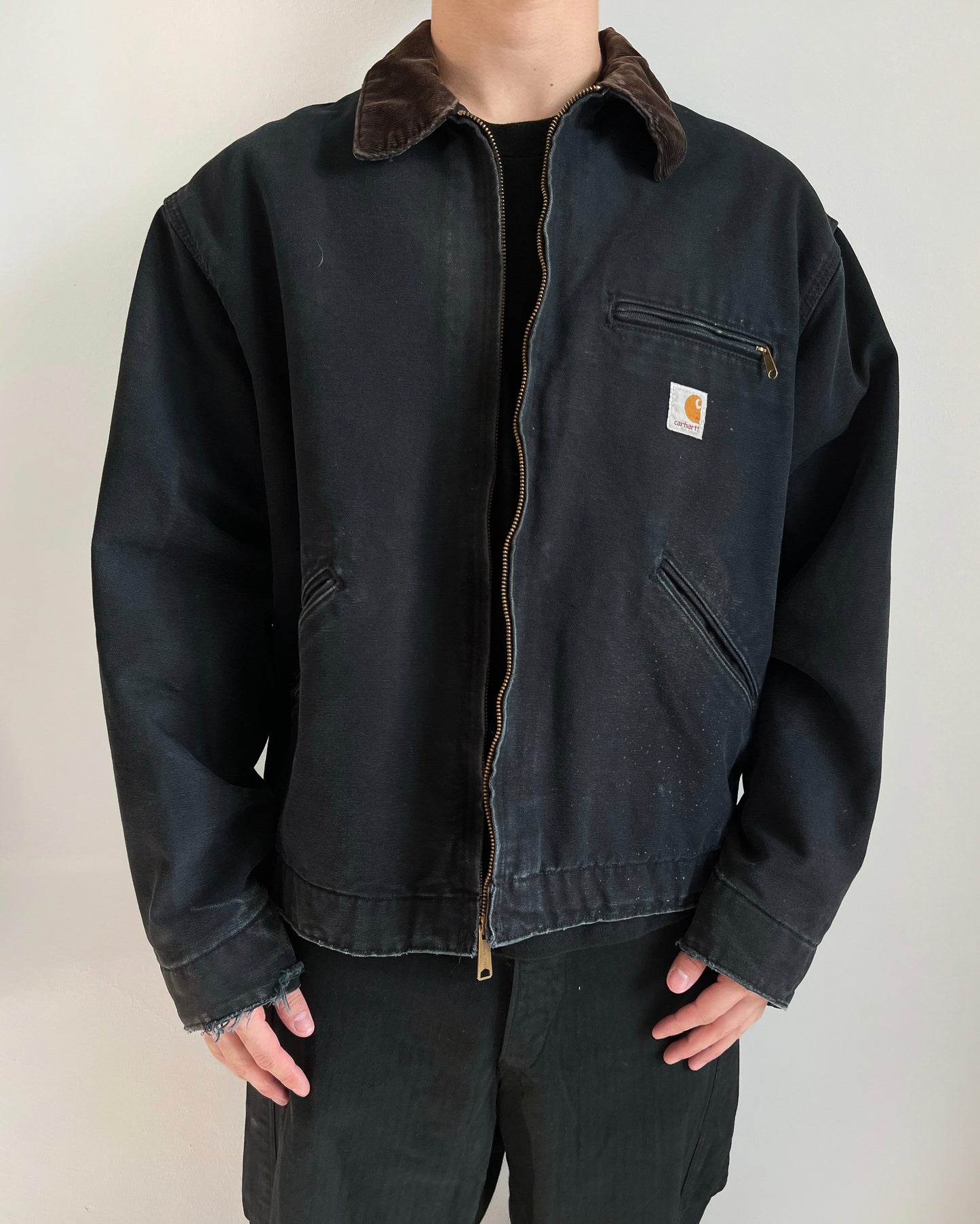 1990S FADED BLACK CARHARTT DETROIT WORK JACKET (XL)
