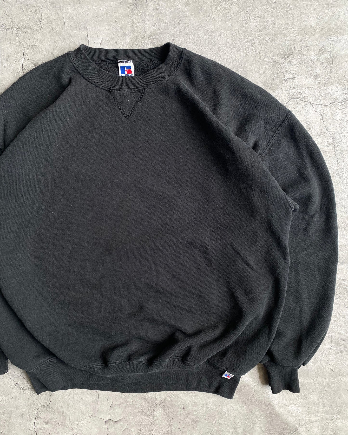 1990S RUSSELL FADED BLACK BLANK CREWNECK SWEATSHIRT (XL/XXL)