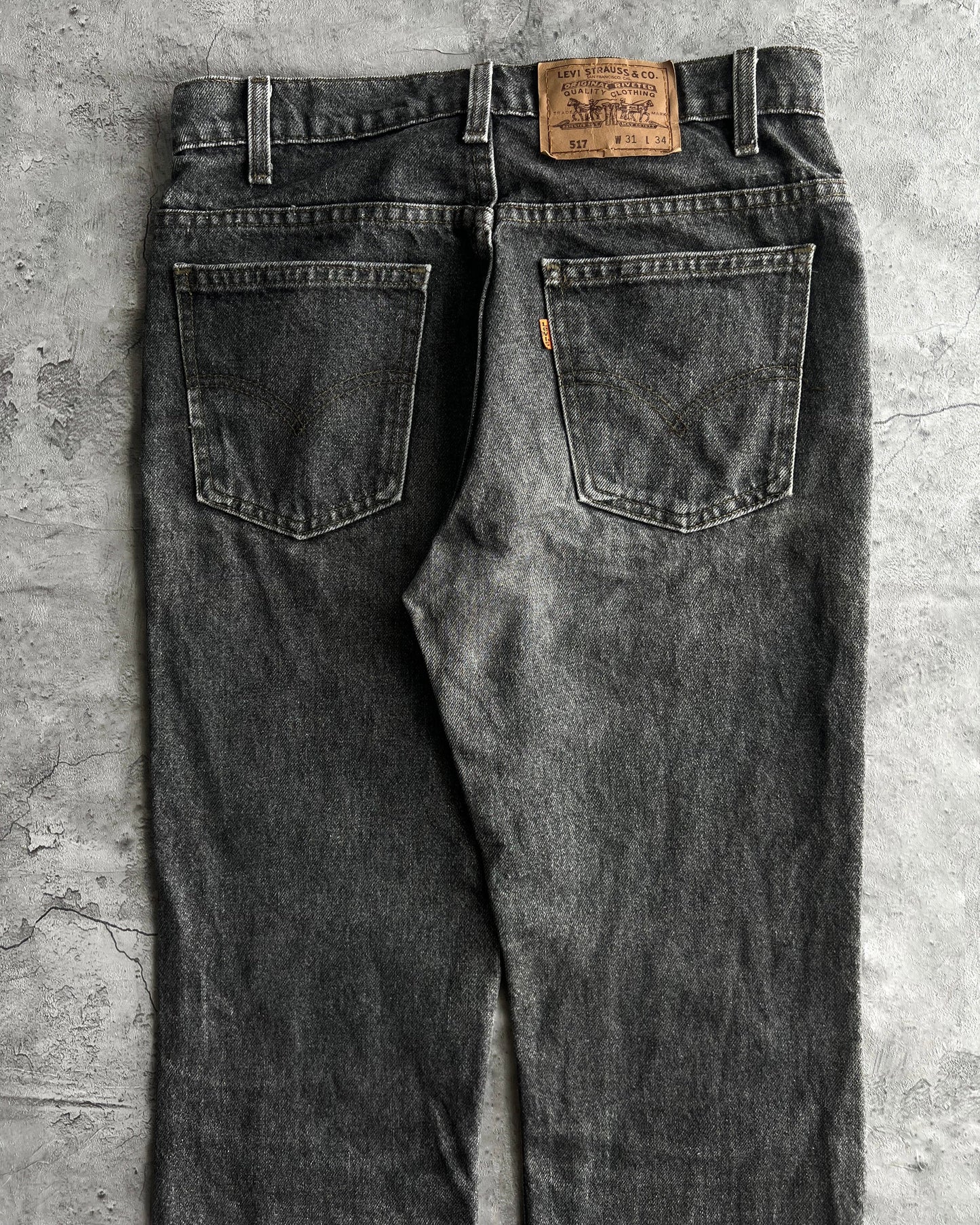 1990S FADED BLACK LEVI'S 517 RELEASED HEM FLARE JEANS (31X34)