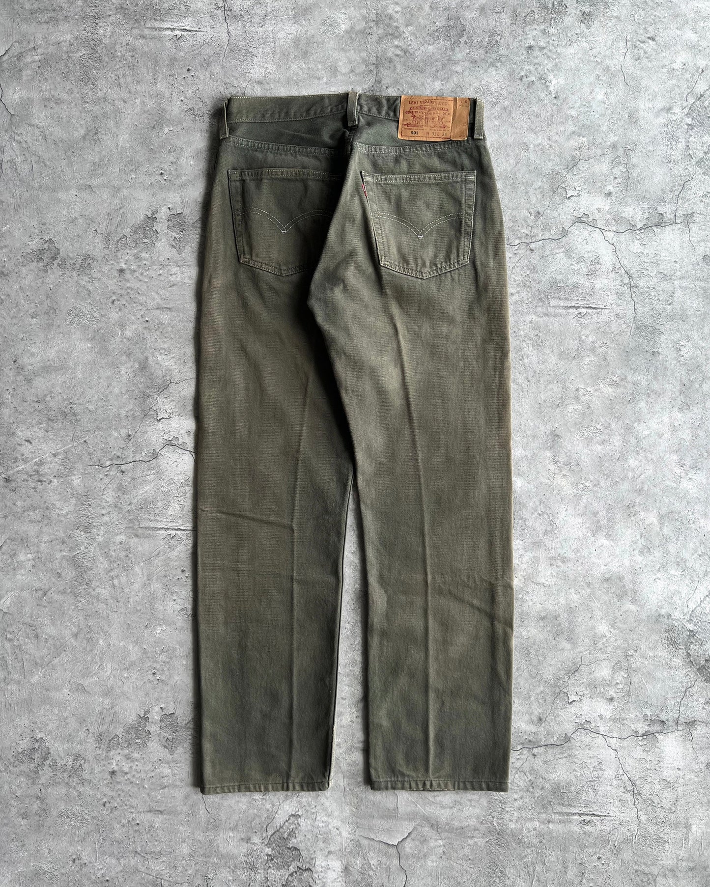 1990S FADED GREEN LEVI'S 501 RELEASED HEM JEANS (31X34)