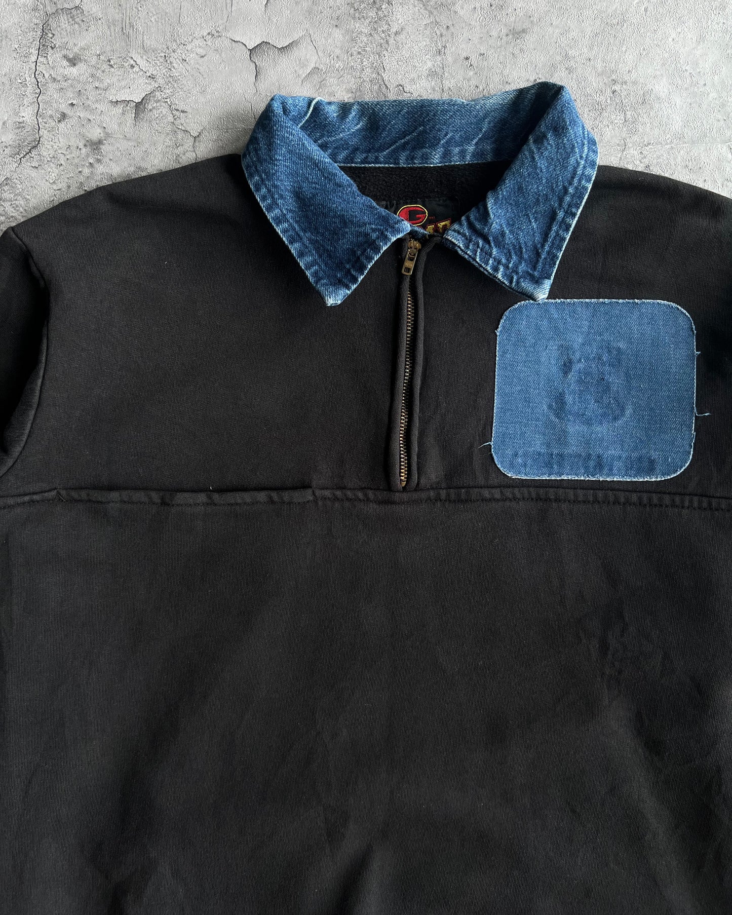 1970S BLACK QUARTER-ZIP DENIM PATCHED SWEATSHIRT (L)