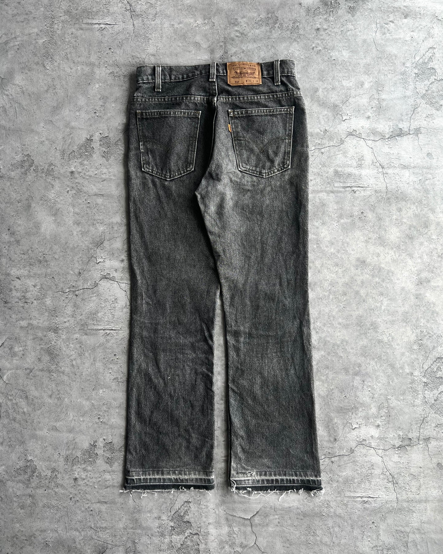 1990S FADED BLACK LEVI'S 517 RELEASED HEM FLARE JEANS (31X34)