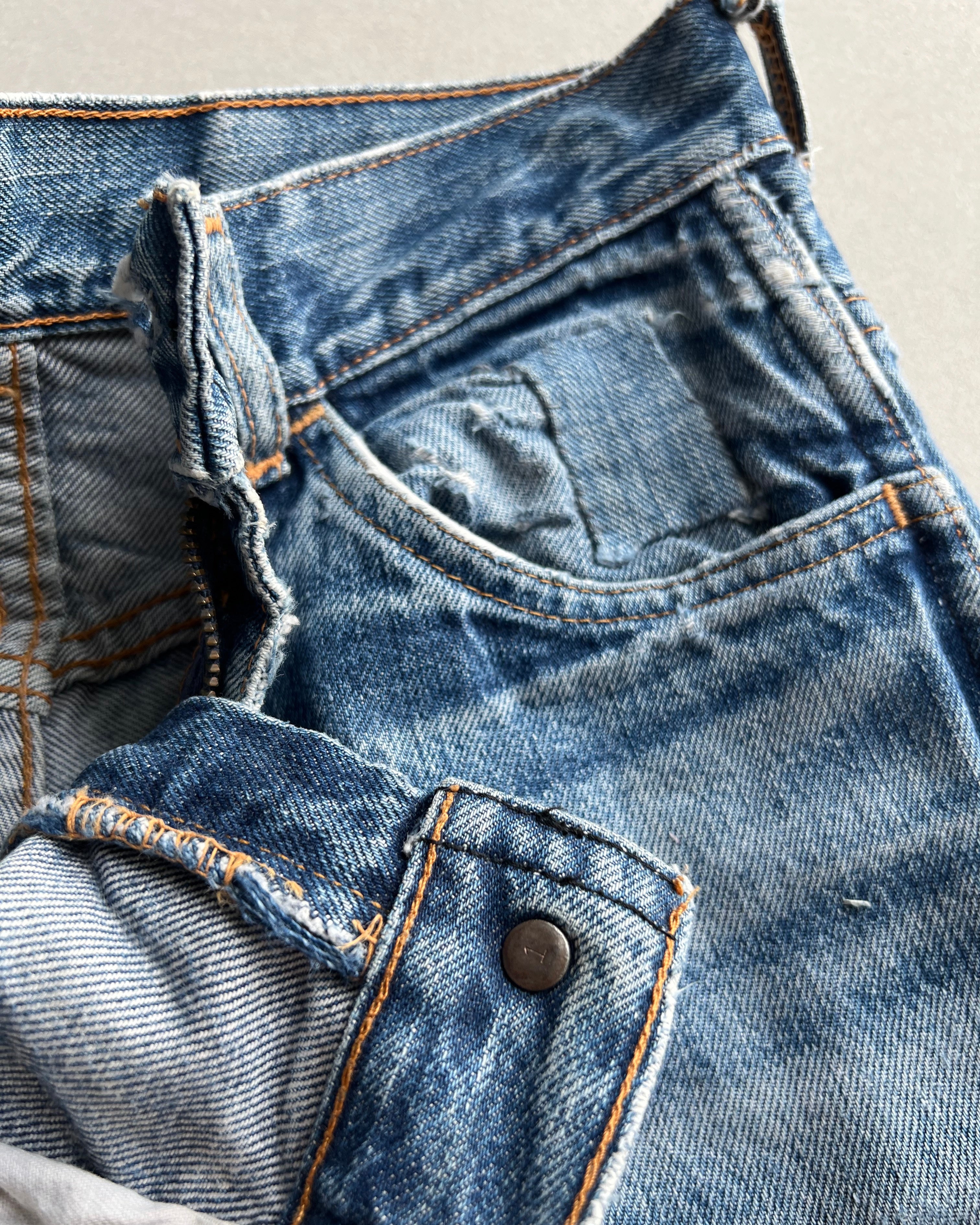 1970S LEVIS PATCHED BOOTCUT JEANS (27X35)