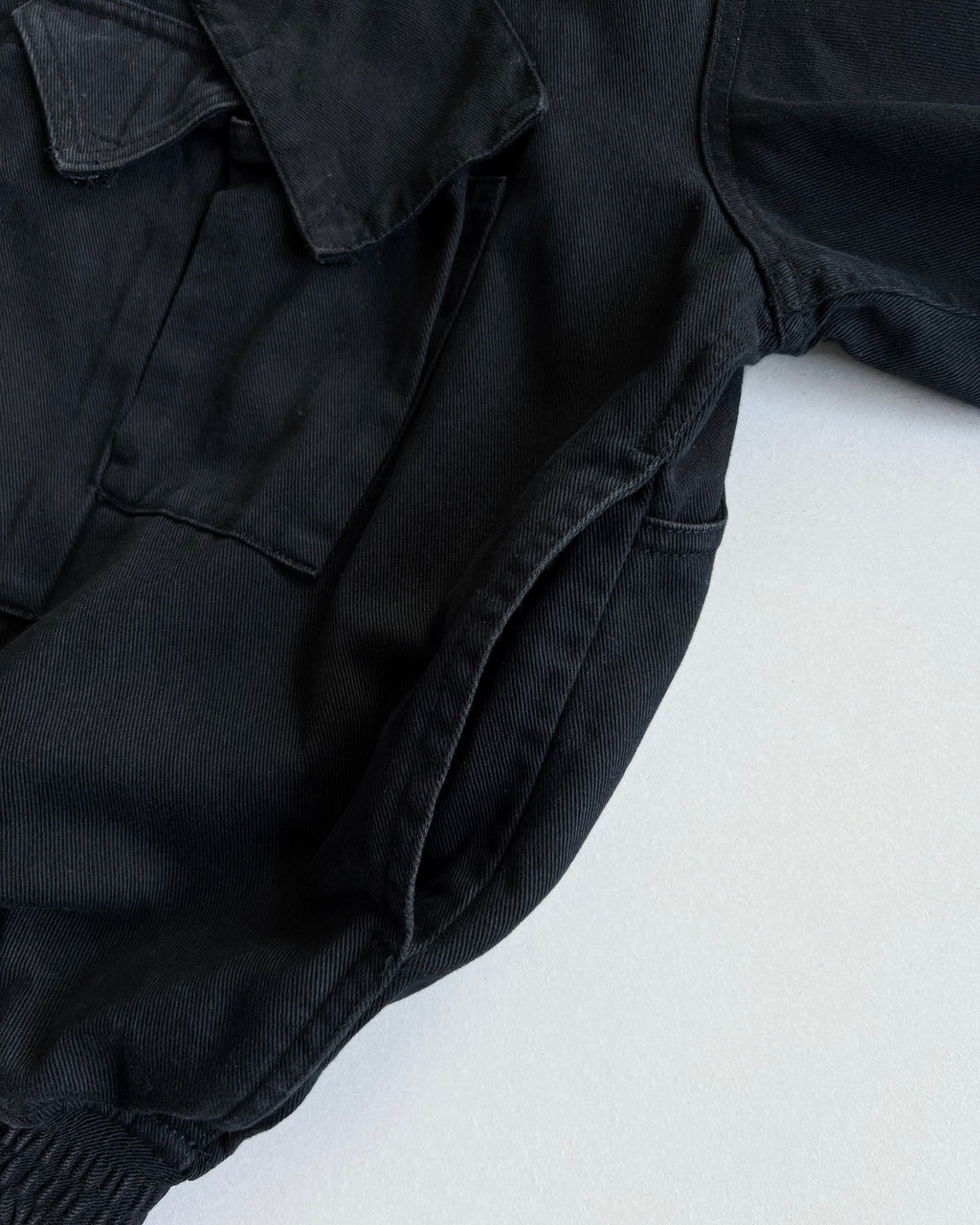 1980S BLACK KATHARINE HAMNETT CARGO BOMBER (M)