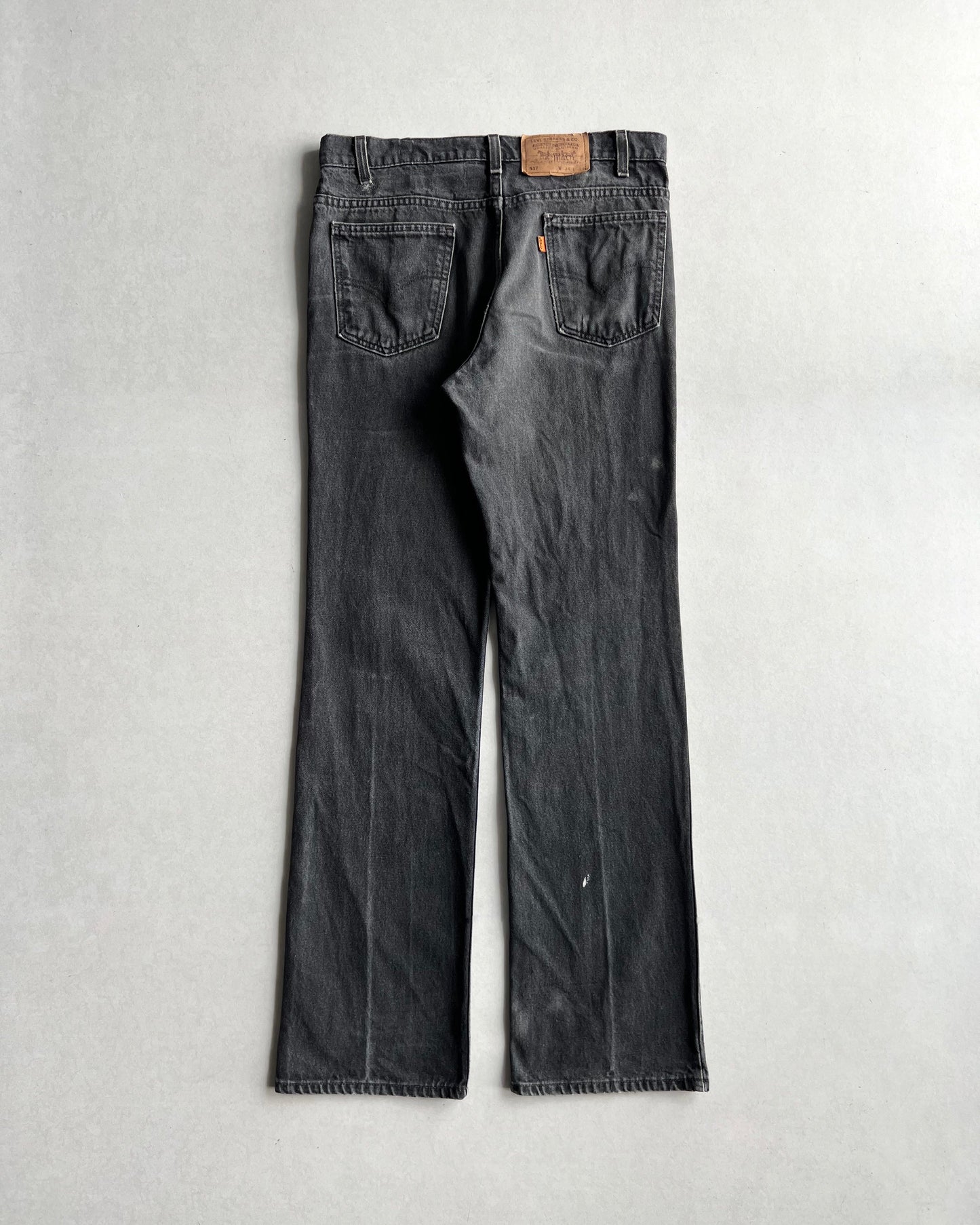 1990S FADED BLACK LEVIS 517 FLARE JEANS (34X34)