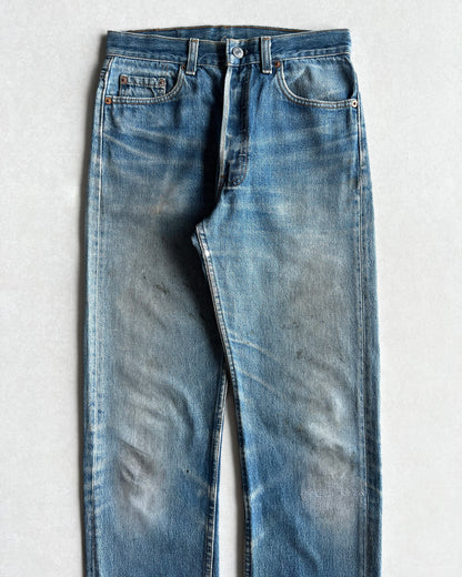 1980S FADED BLUE LEVI'S 501 REPAIRED JEANS (30X36)