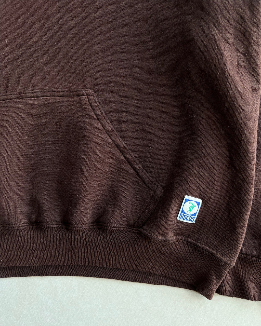1990S BROWN BLANK DISCUS ATHLETIC HOODIE (L)