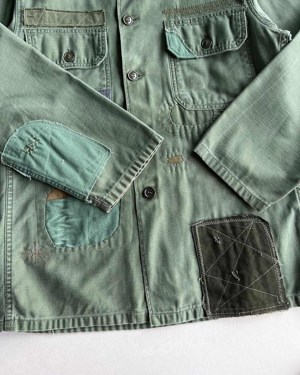 1960S US ARMY OG-107 P63 REPAIRED FATIGUE SHIRT (M)