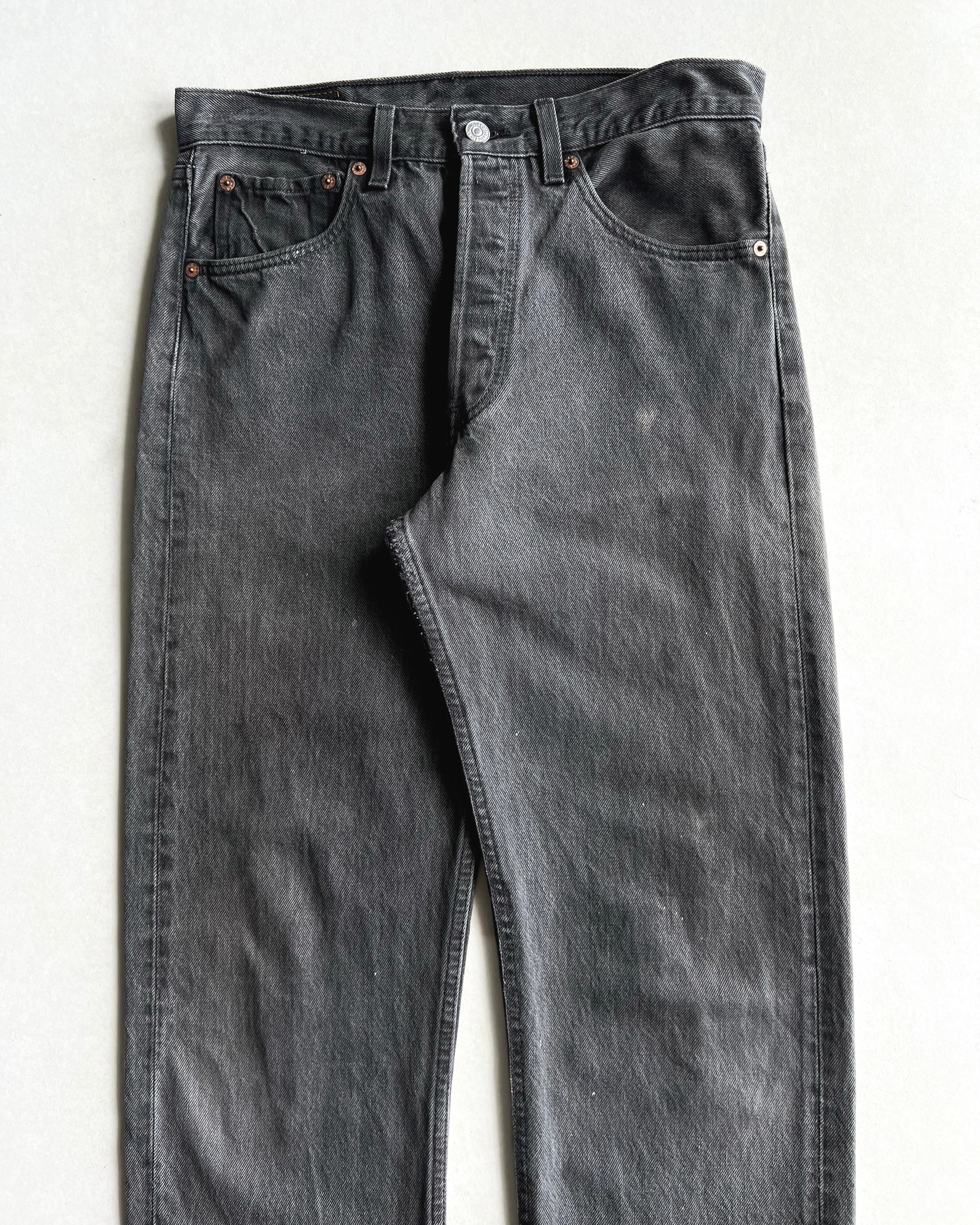 1990S FADED BLACK LEVI'S 501 RELEASED HEM JEANS (31X32)