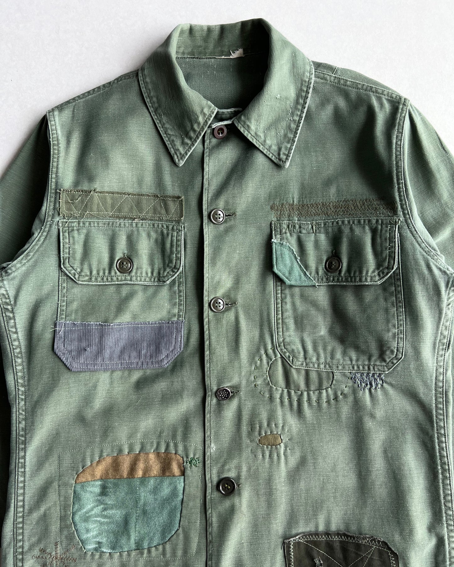 1960S US ARMY OG-107 P63 REPAIRED FATIGUE SHIRT (M)