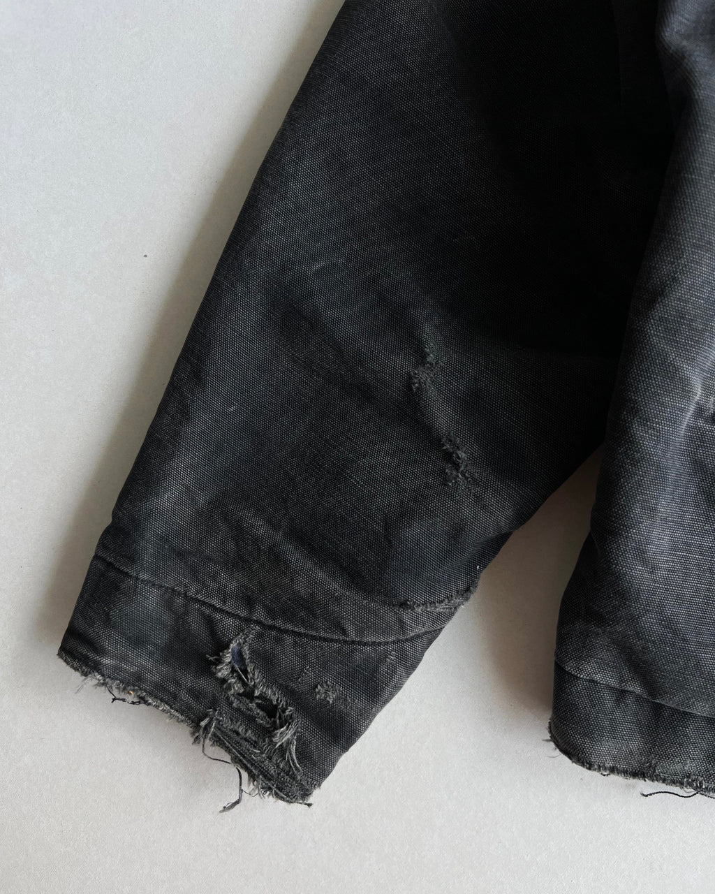 FADED BLACK CARHARTT DETROIT WORK JACKET (L/XL)