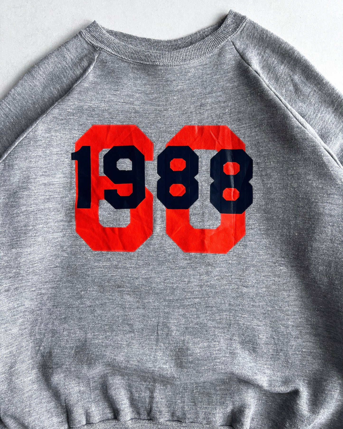 1970S RUSSELL 'ROBERT RETIRED' RAGLAN SWEATSHIRT (XL)