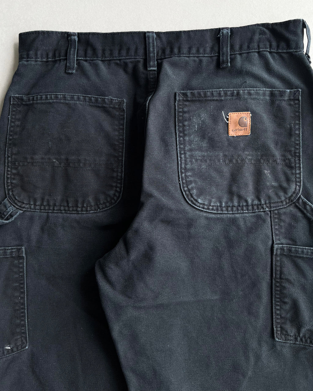 BLACK CARHARTT CARPENTER REPAIRED WORK PANTS (31X31)