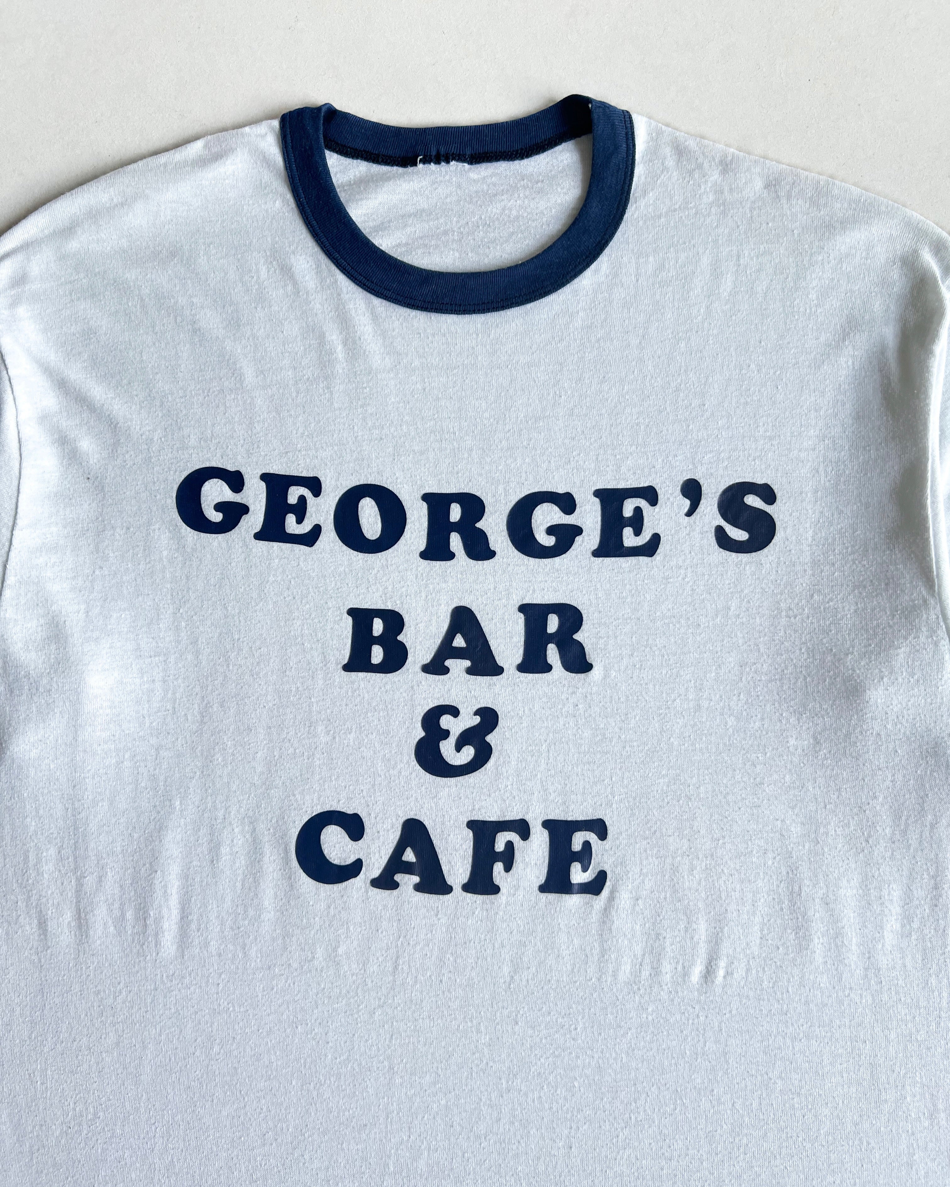 1980S 'GEORGE'S BAR AND CAFE' SINGLE STITCH RINGER TEE (L)