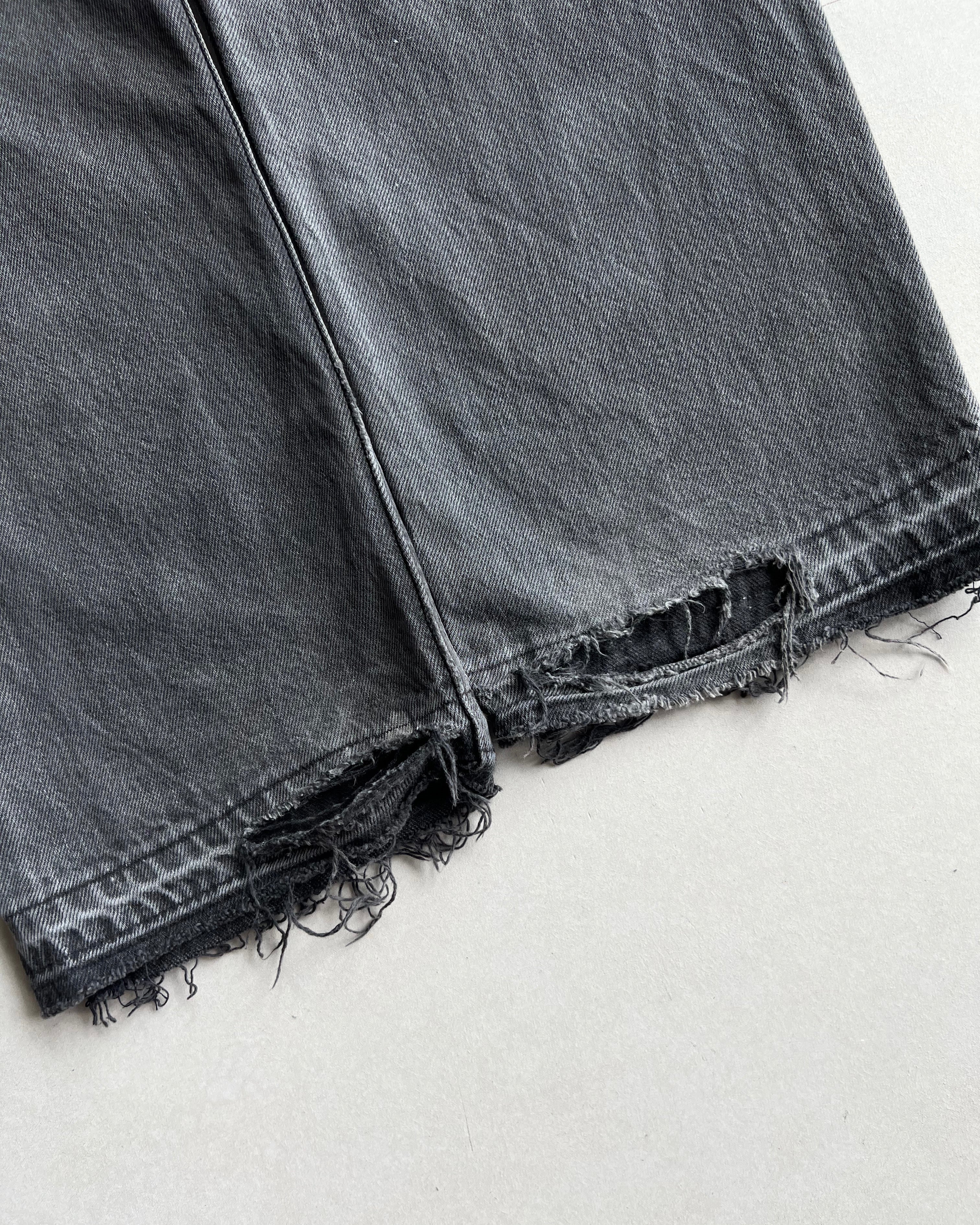 1990S FADED BLACK LEVI'S 501 RELEASED HEM JEANS (31X32)
