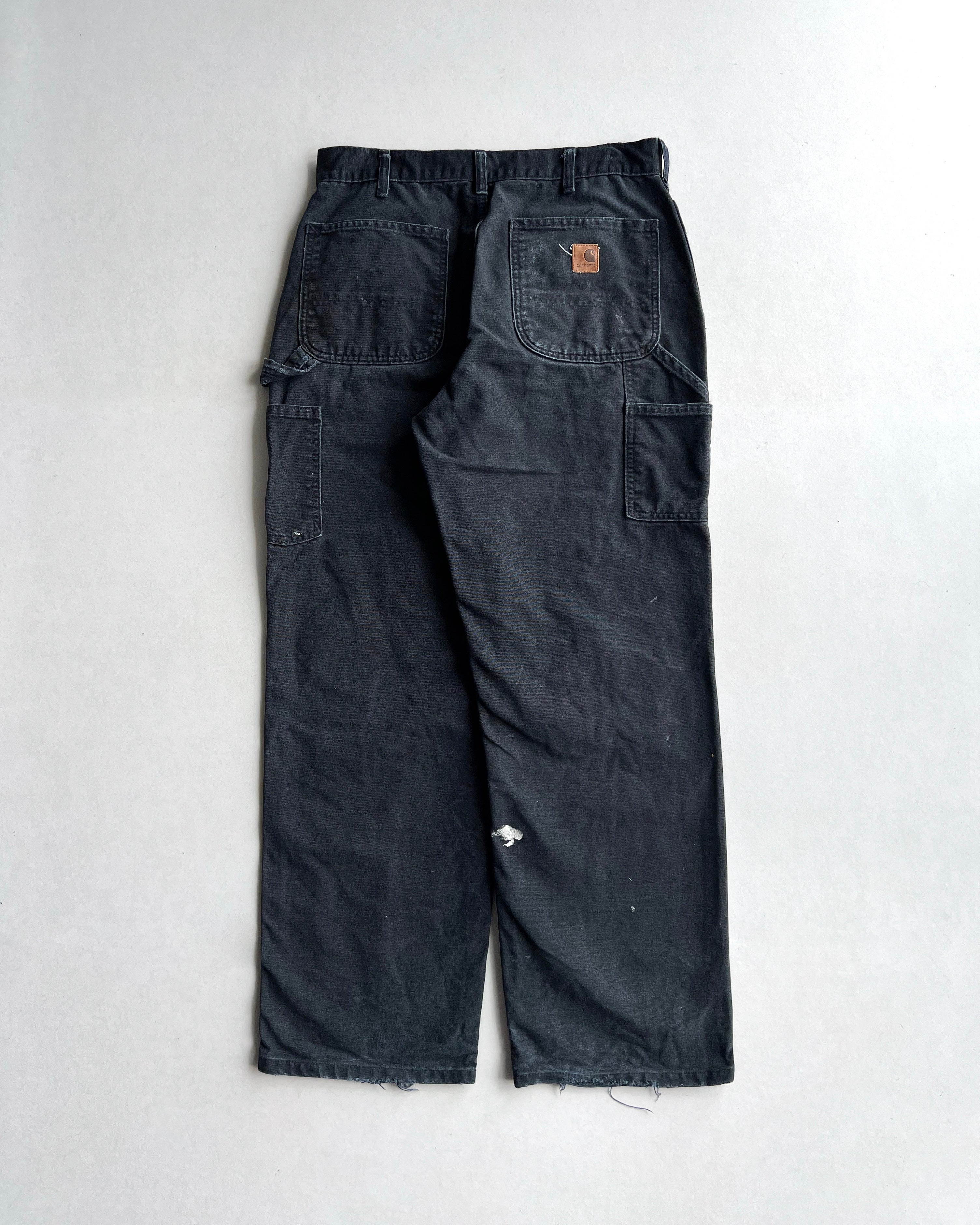BLACK CARHARTT CARPENTER REPAIRED WORK PANTS (31X31)