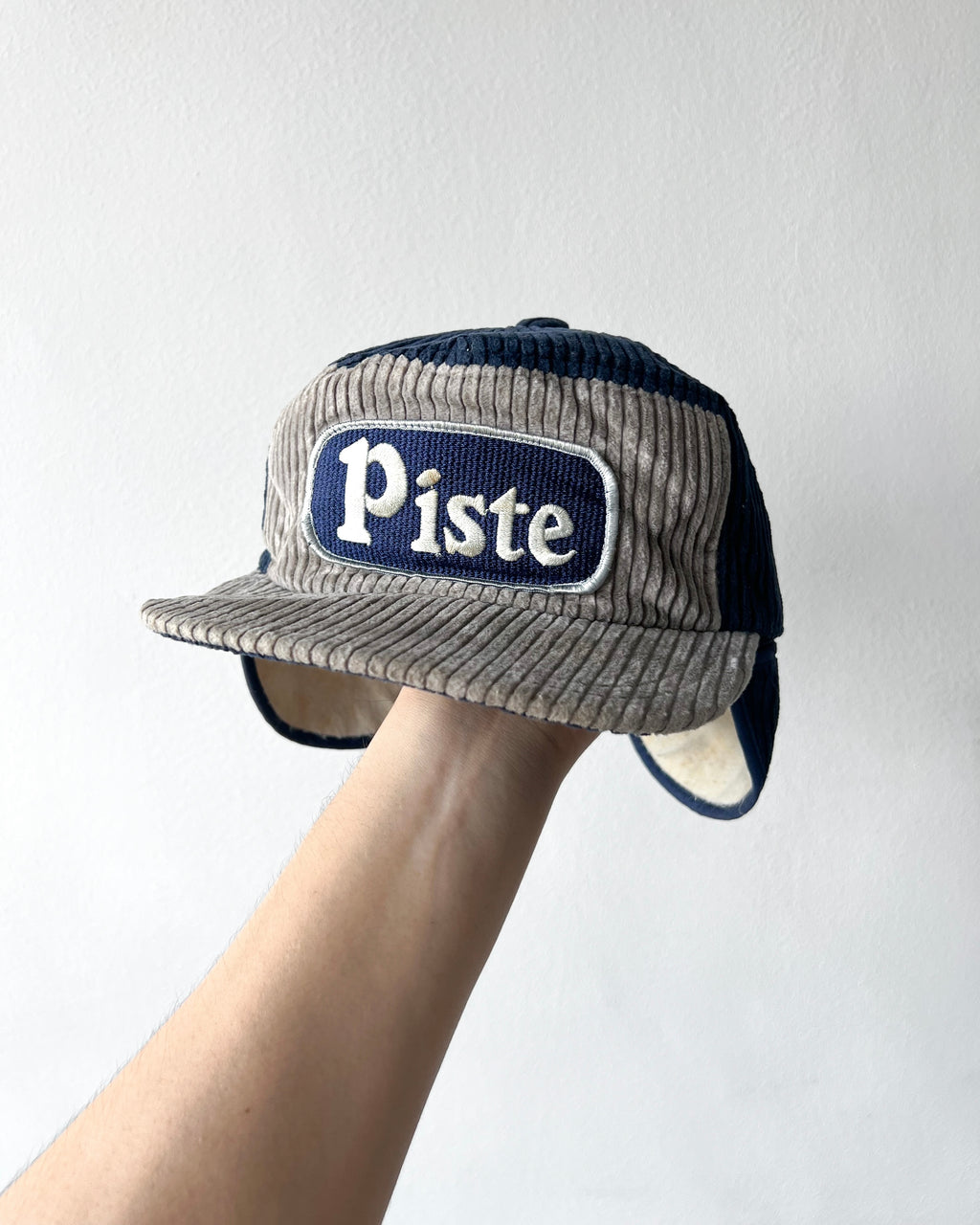 1990S SALOMON 'PISTE' CORDUROY TRUCKER CAP (OS)
