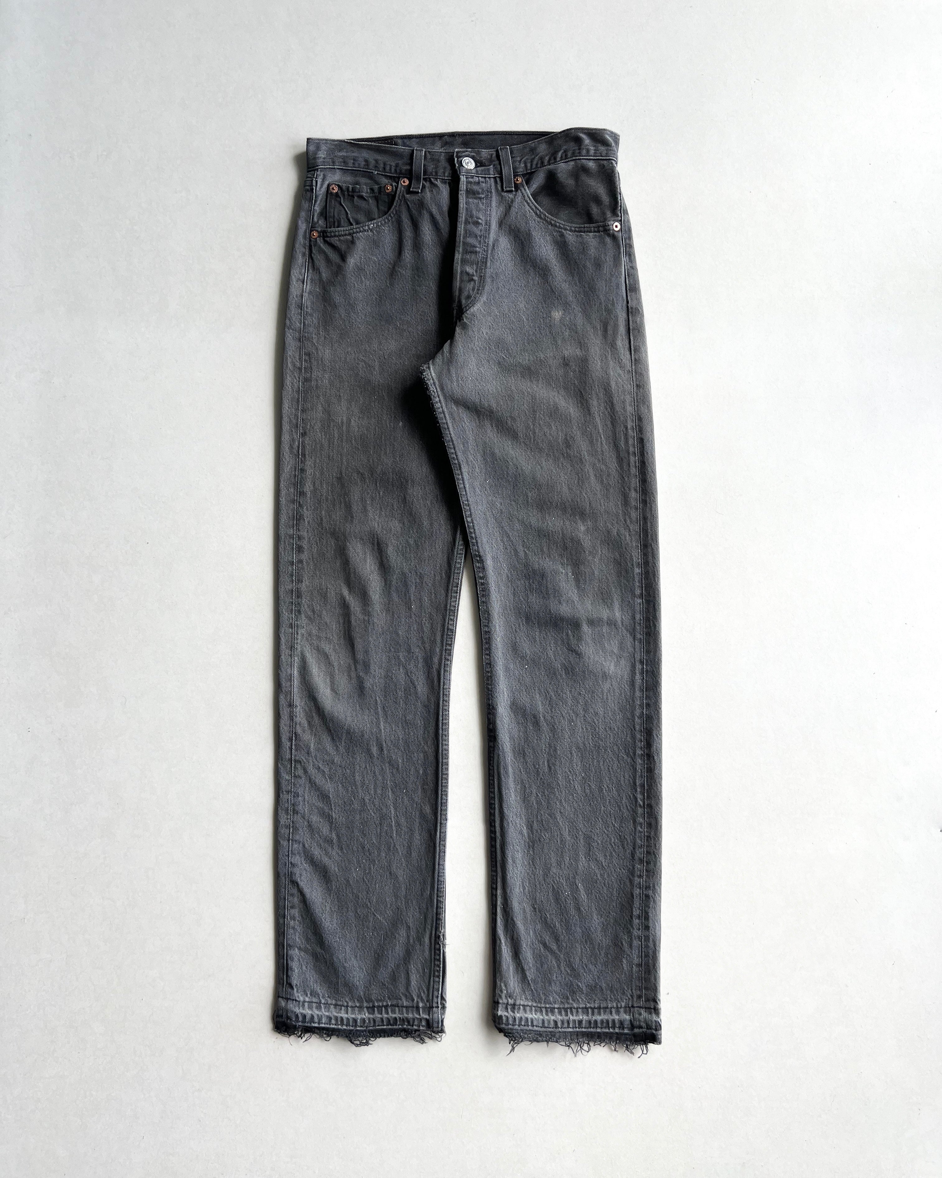 1990S FADED BLACK LEVI'S 501 RELEASED HEM JEANS (31X32)