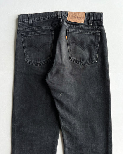 1990S FADED BLACK LEVI'S 505 RELEASED HEM JEANS (33X31)