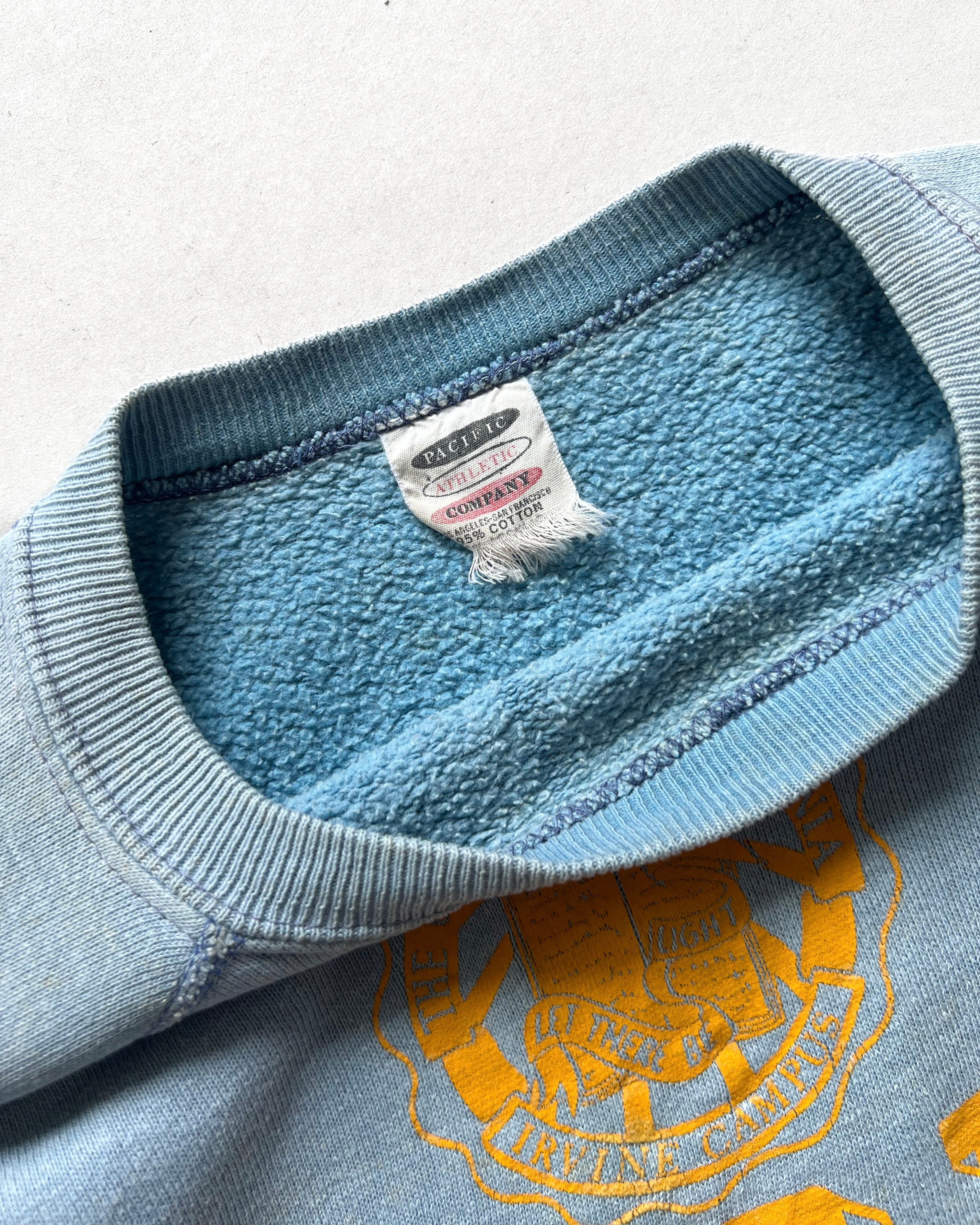 1960S FADED 'UCI' RAGLAN SWEATSHIRT (XL)