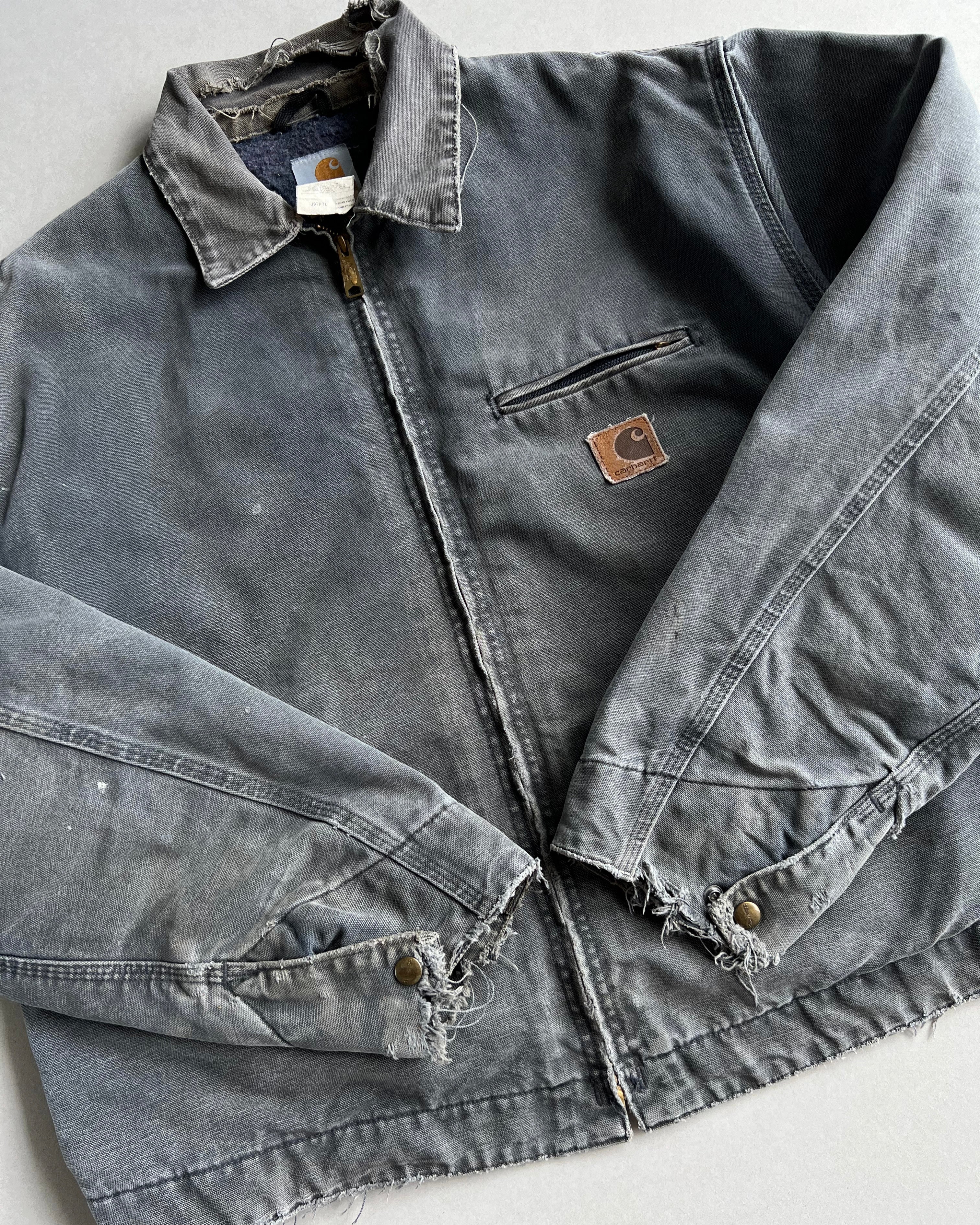 1990S FADED GREY CARHARTT DETROIT DISTRESSED WORK JACKET (XL)