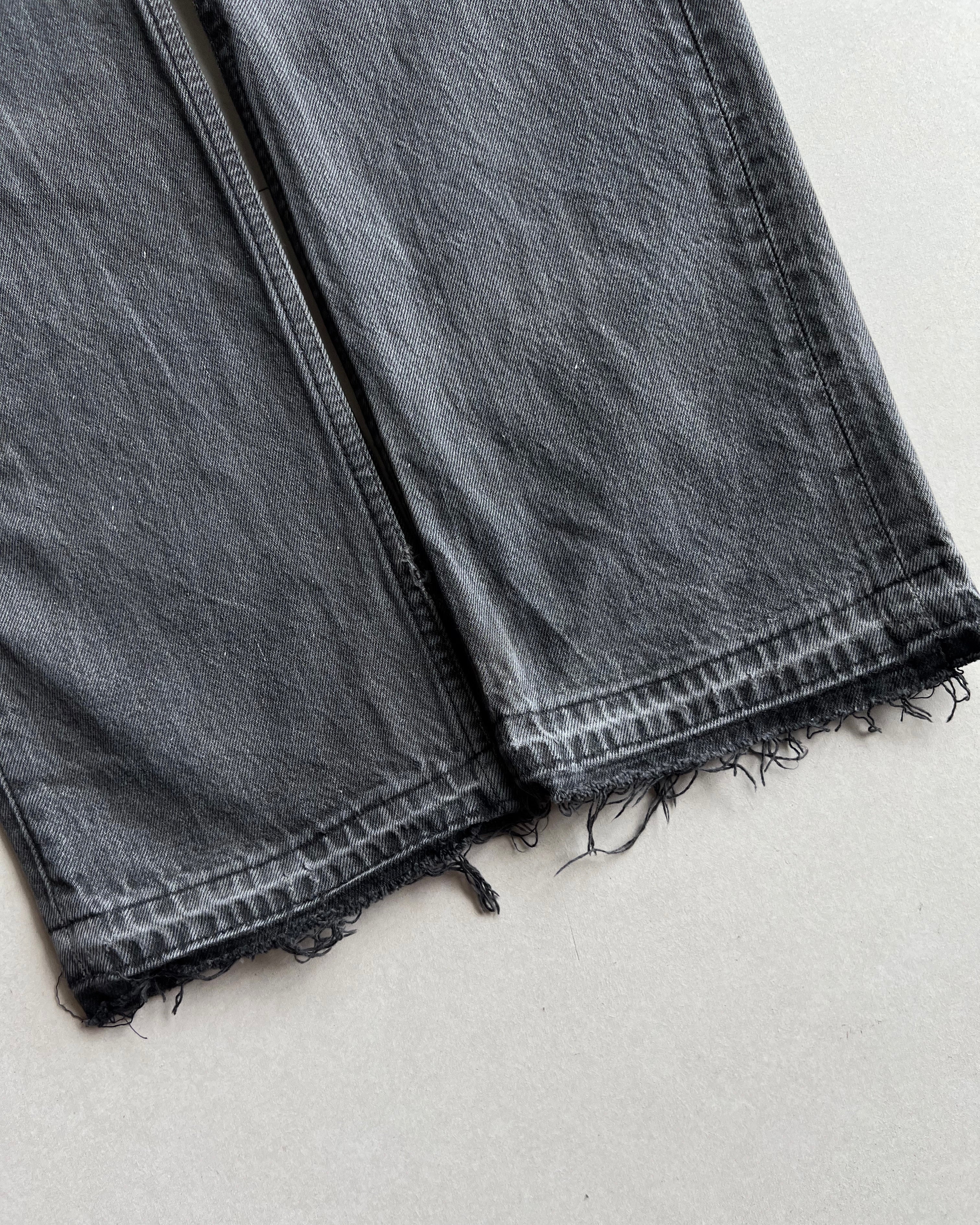 1990S FADED BLACK LEVI'S 501 RELEASED HEM JEANS (31X32)