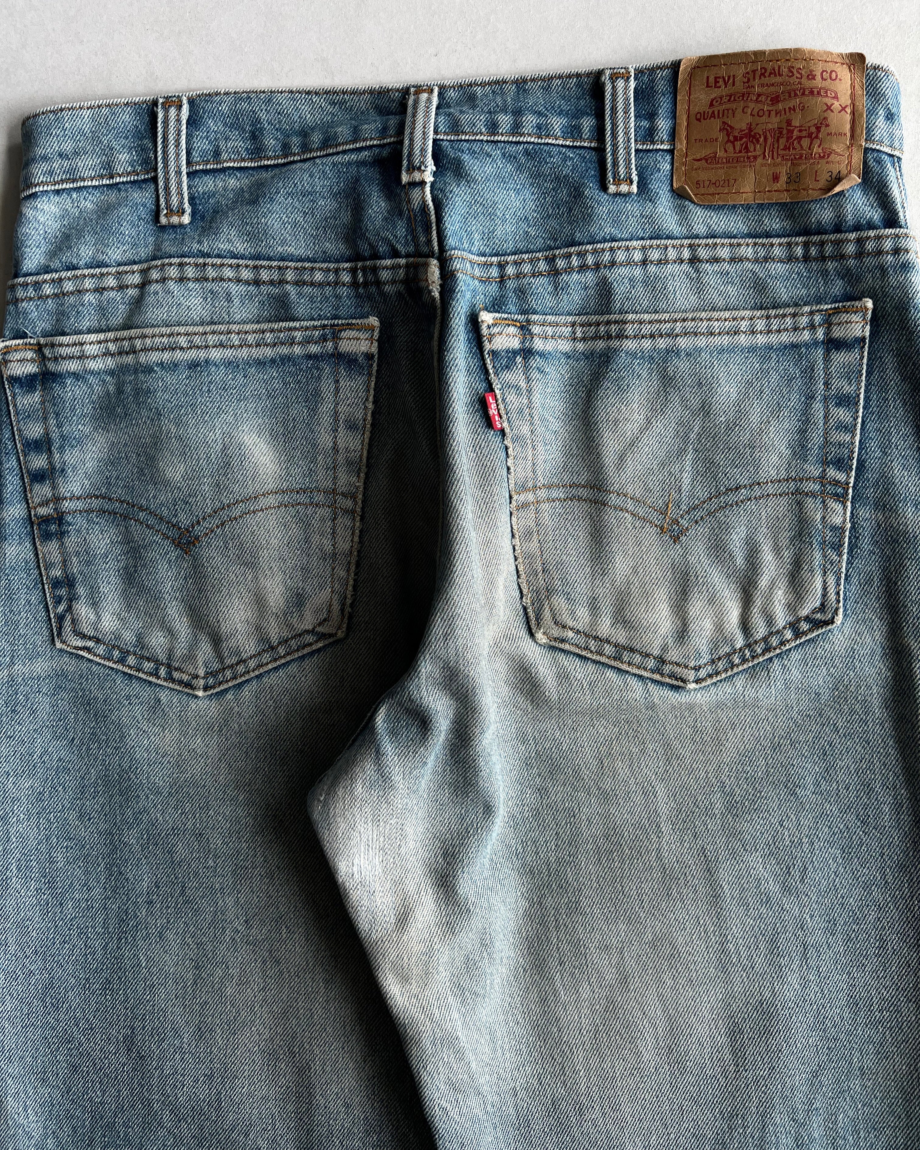 1990S FADED WASHED LEVI'S 517 REPAIRED JEANS (33X34)