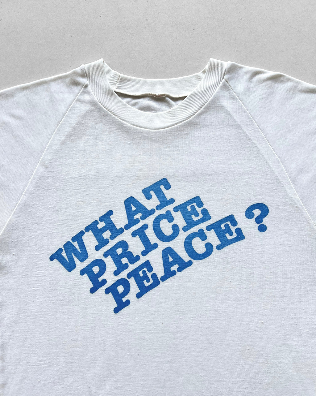 1970S 'WHAT PRICE PEACE' RAGLAN SINGLE STITCH TEE (M)