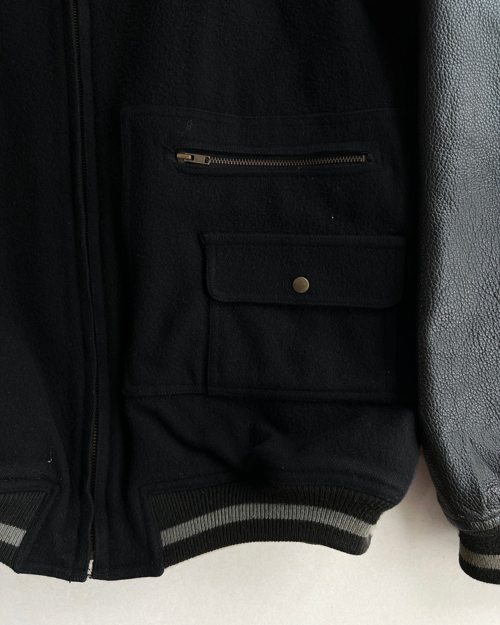 1980S ISSEY MIYAKE SPORT BLACK LEATHER SLEEVE VARSITY JACKET (M)