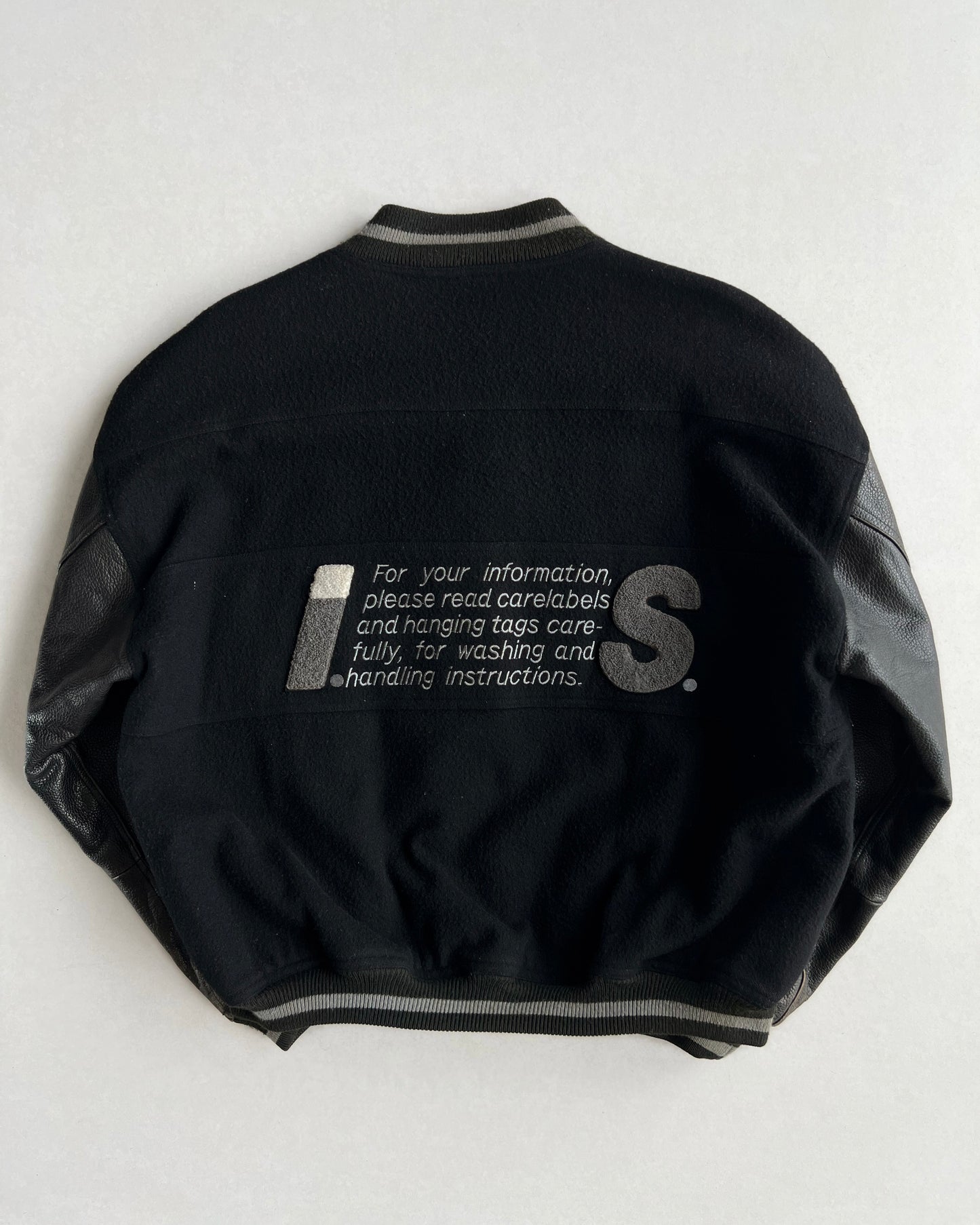 1980S ISSEY MIYAKE SPORT BLACK LEATHER SLEEVE VARSITY JACKET (M)