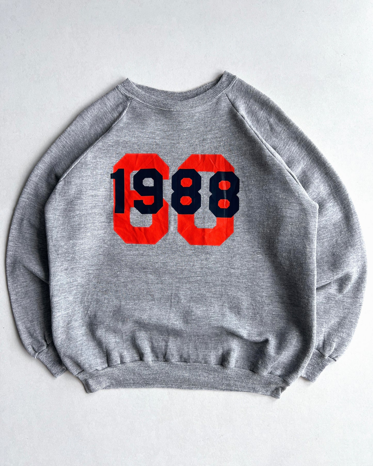 1970S RUSSELL 'ROBERT RETIRED' RAGLAN SWEATSHIRT (XL)