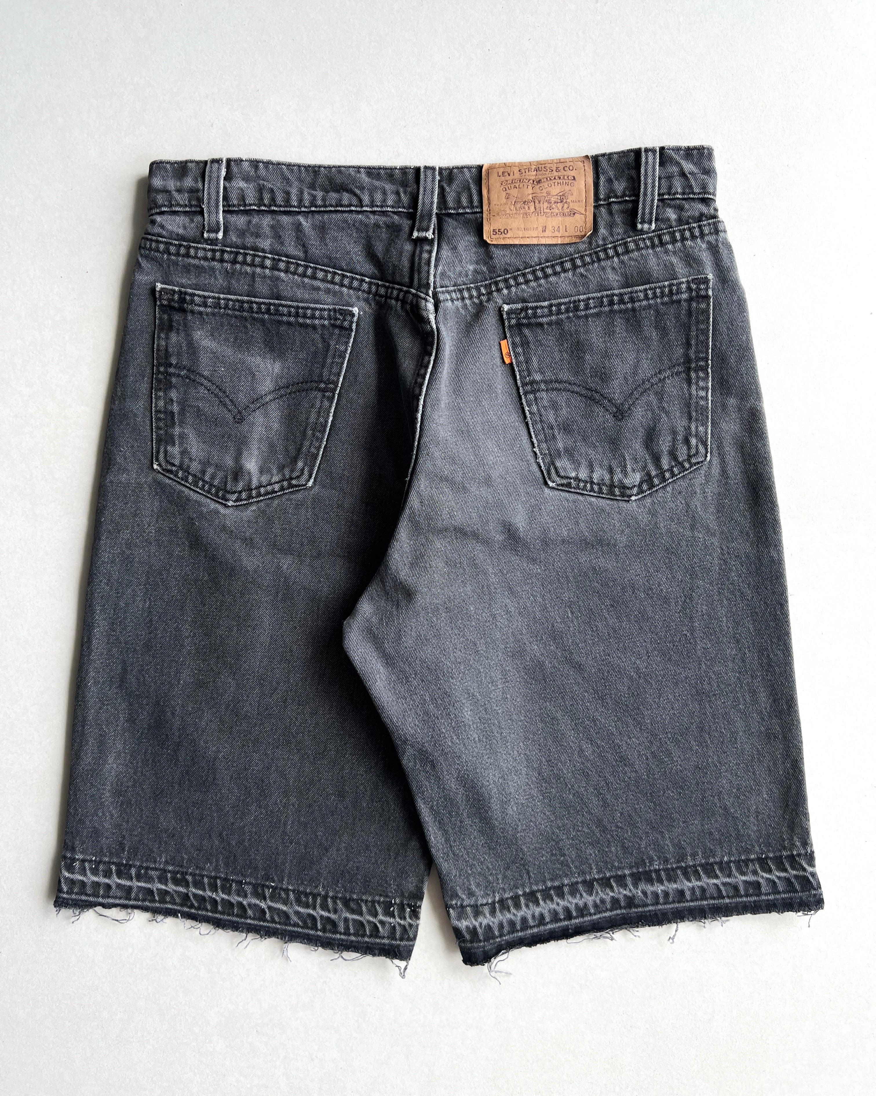 1990S FADED LEVI'S 550 RELEASED HEM SHORTS (34X00)