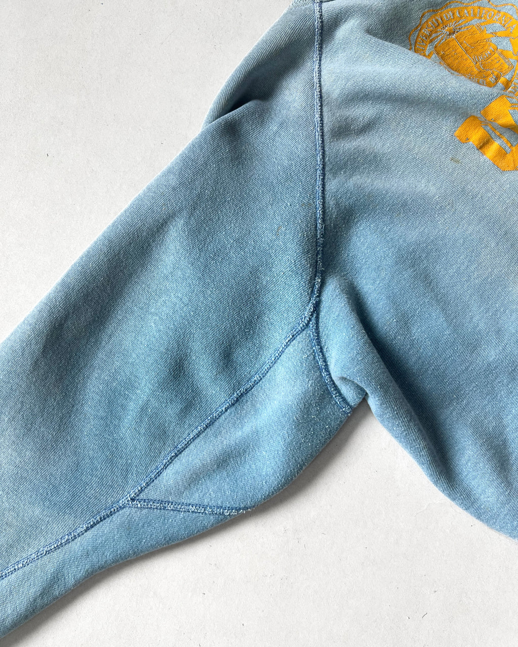 1960S FADED 'UCI' RAGLAN SWEATSHIRT (XL)